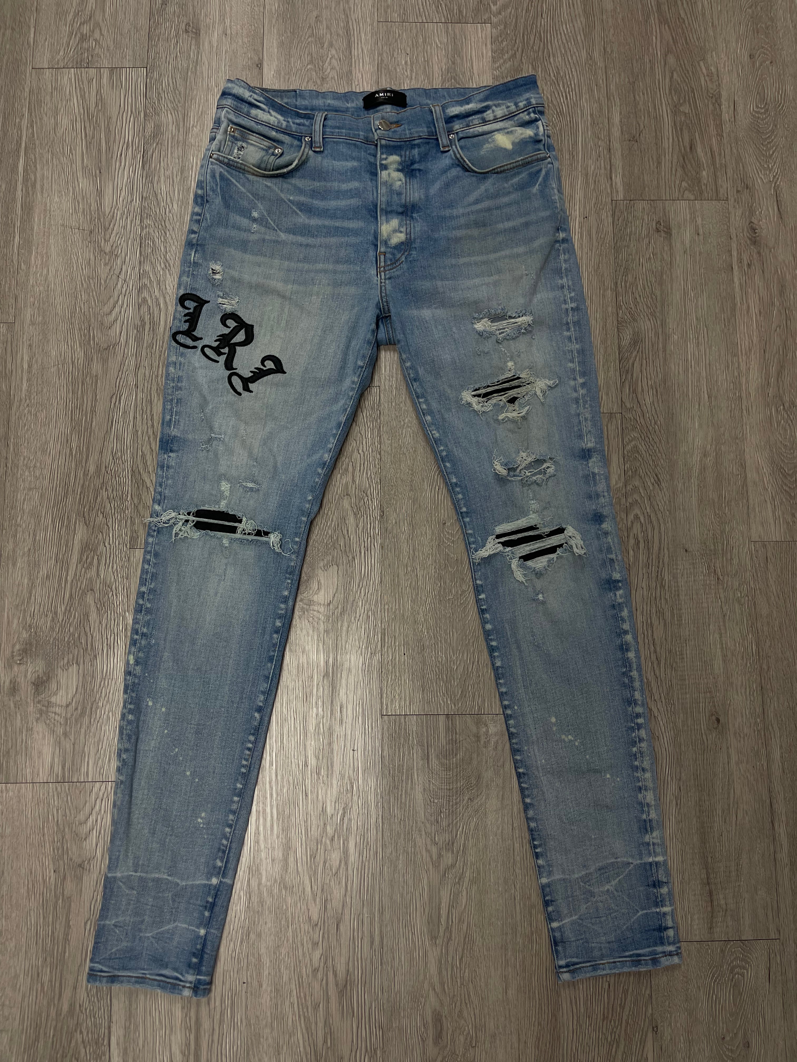 Amiri Light Wash Old English Jeans