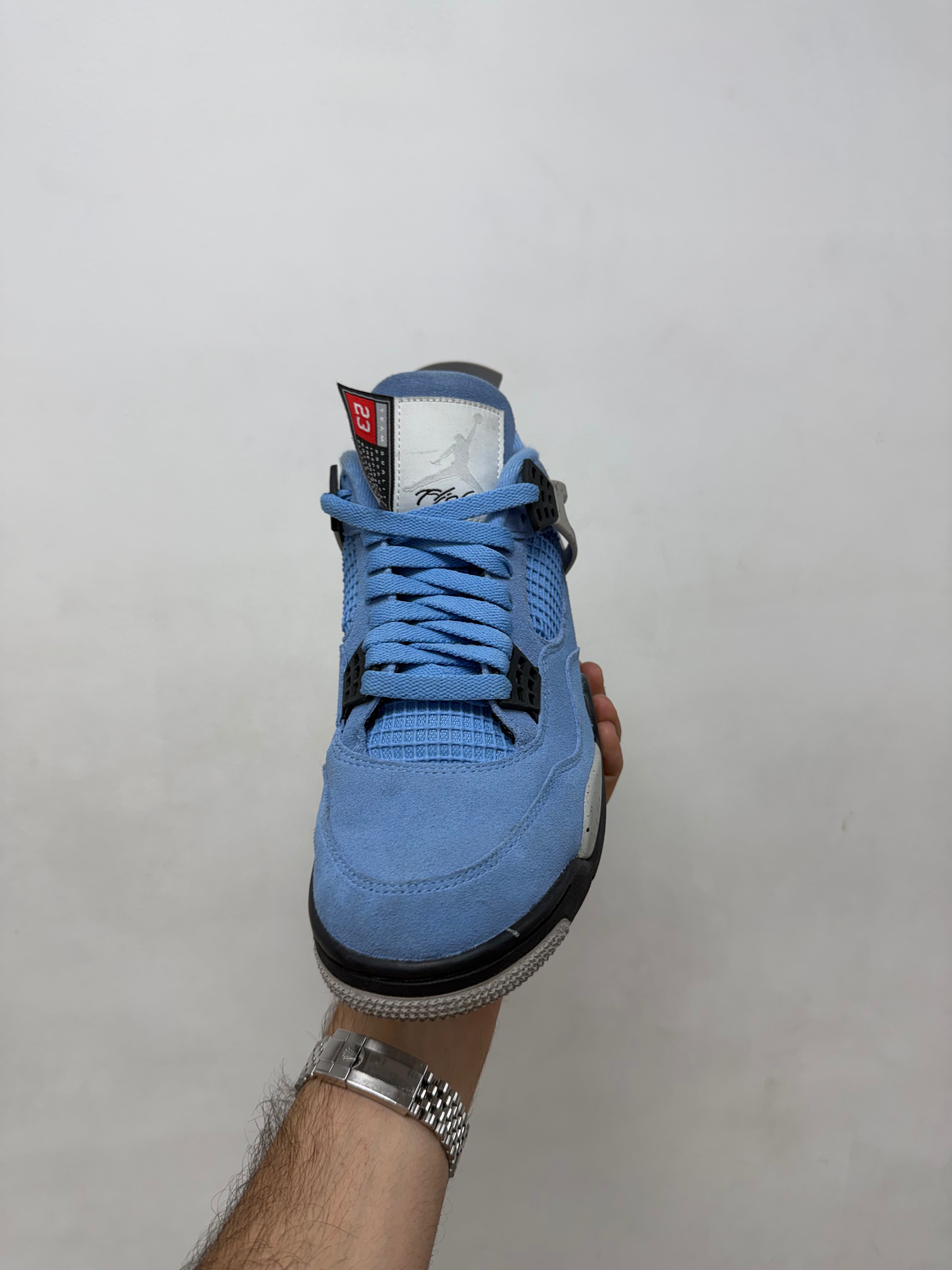 Jordan 4 University Blue Sneakers