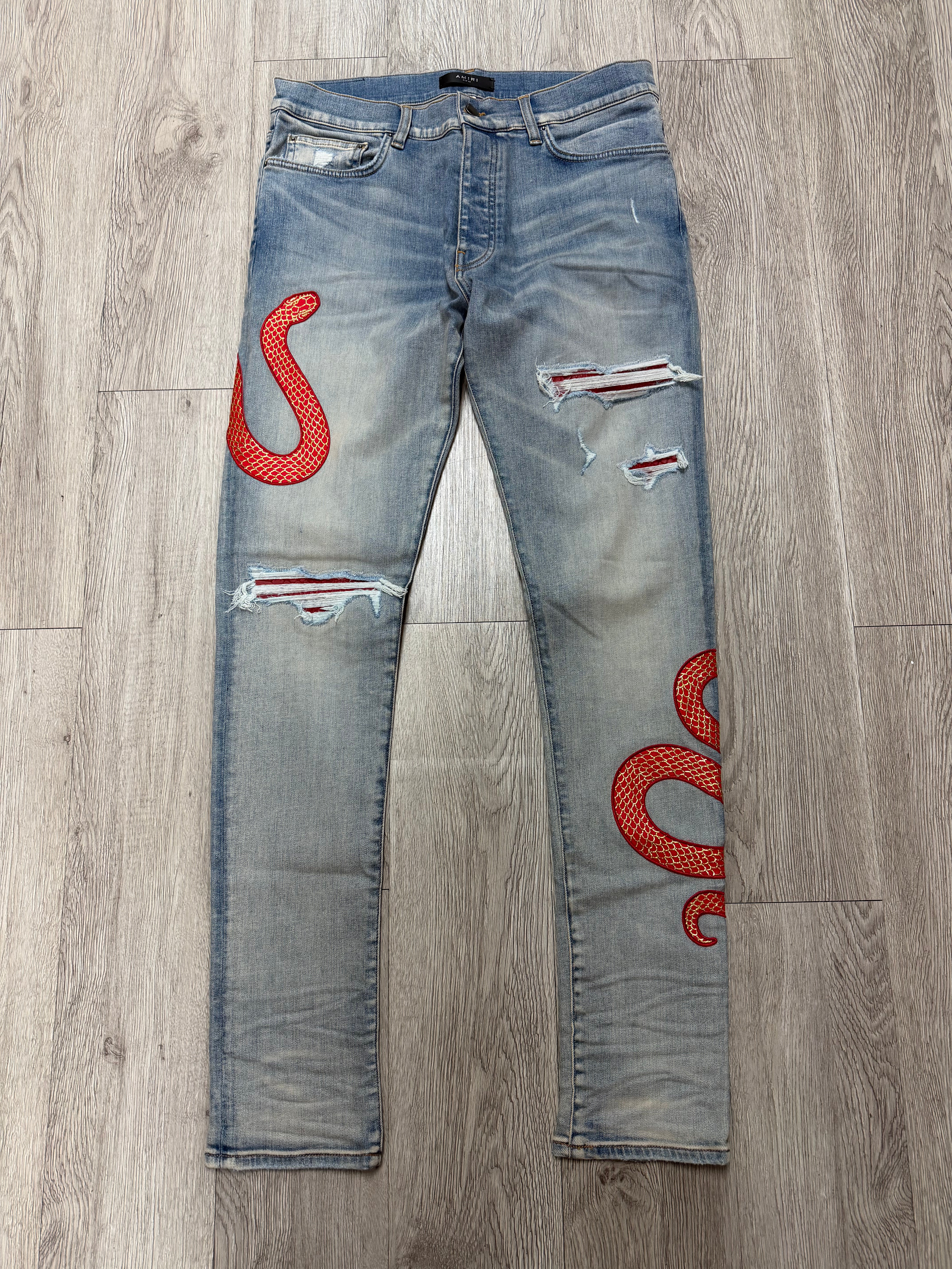 Amiri Light Wash Snake Skin Red Gold Jeans