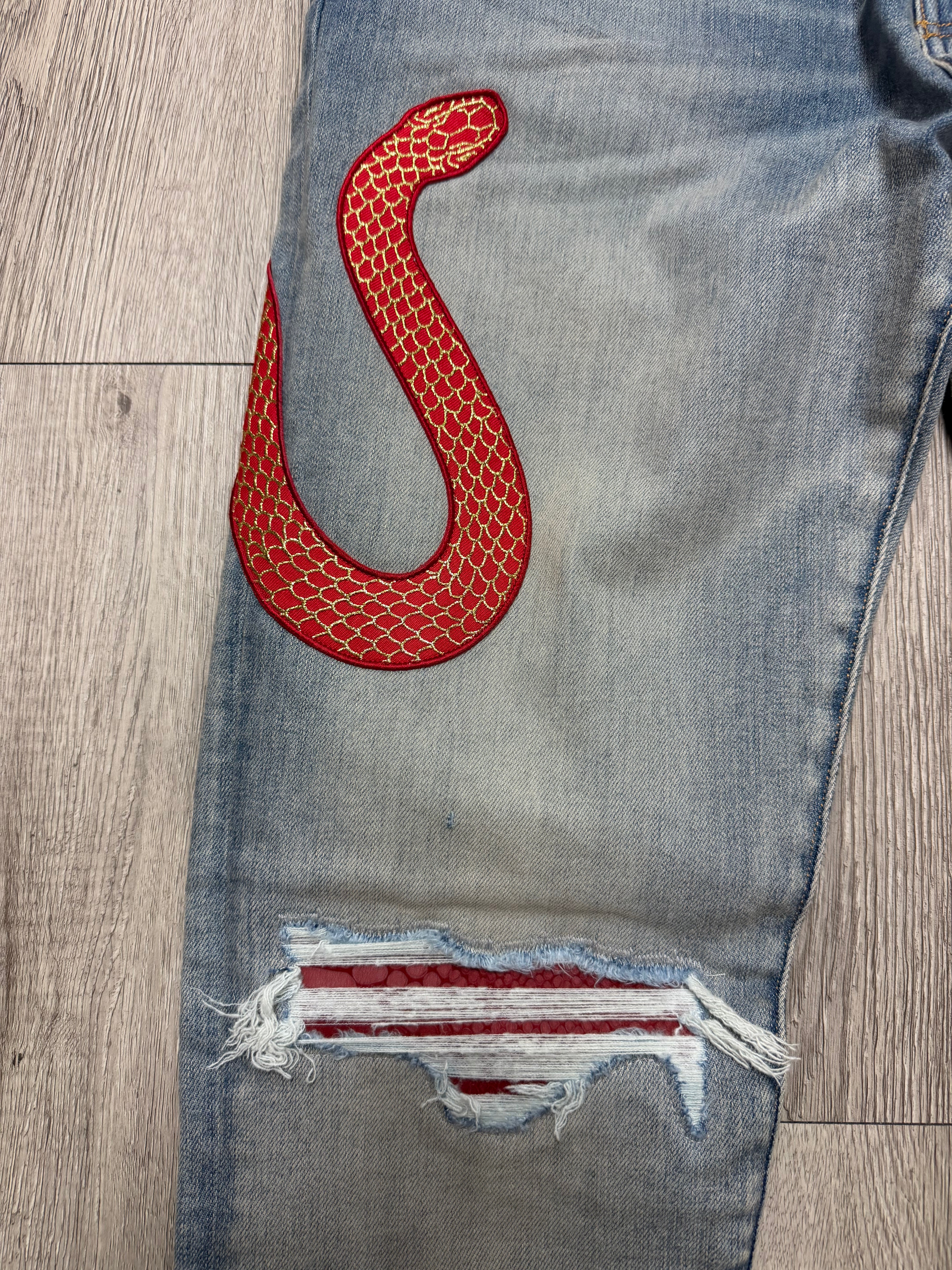 Amiri Light Wash Snake Skin Red Gold Jeans