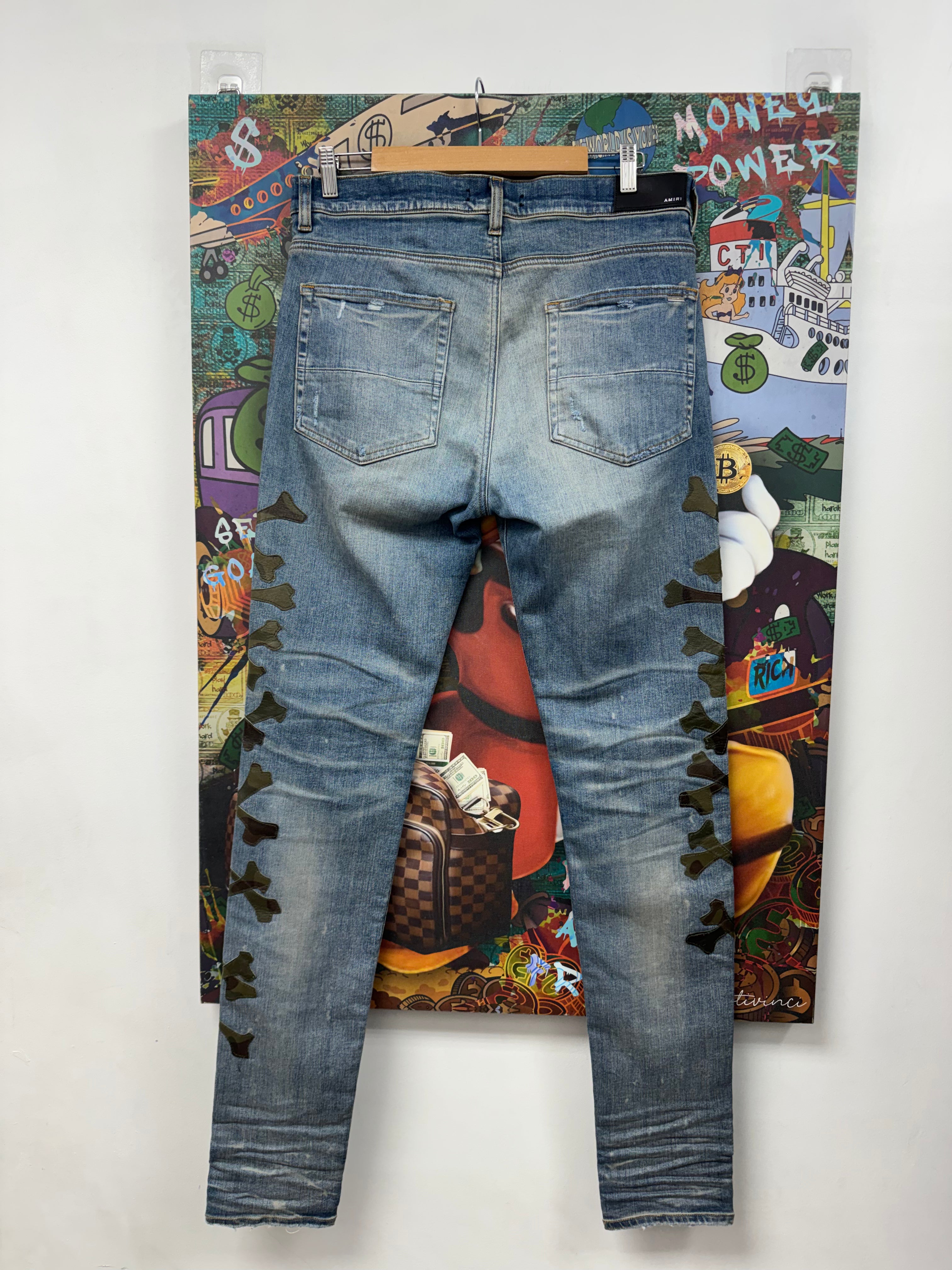 Amiri Light Wash Camo Bones Jeans