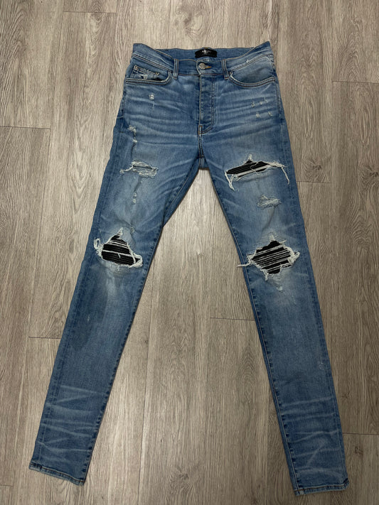 Amiri Light Wash Black Patch MX1 Jeans