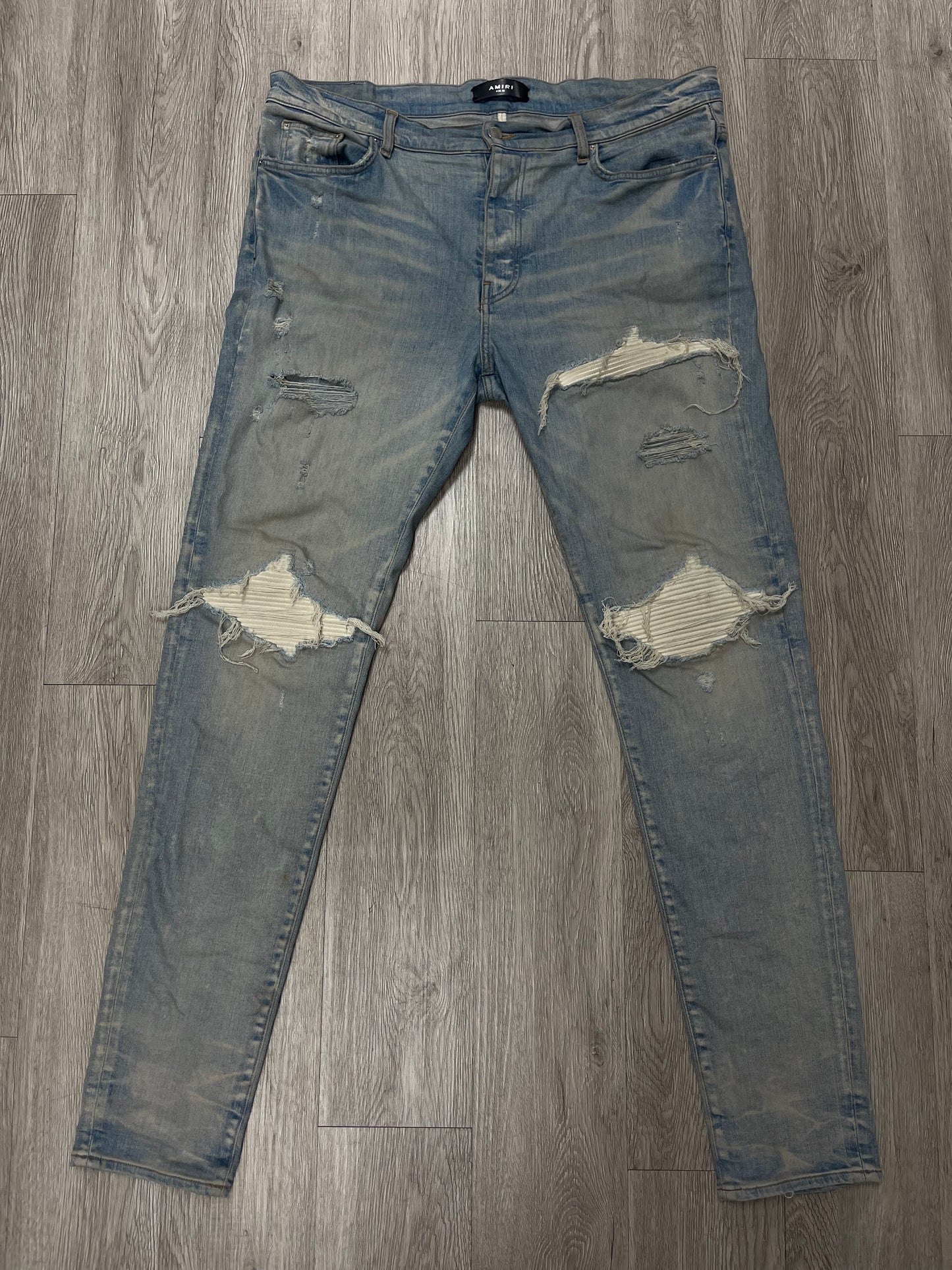 Amiri MX1 Light Wash White Patch Jeans