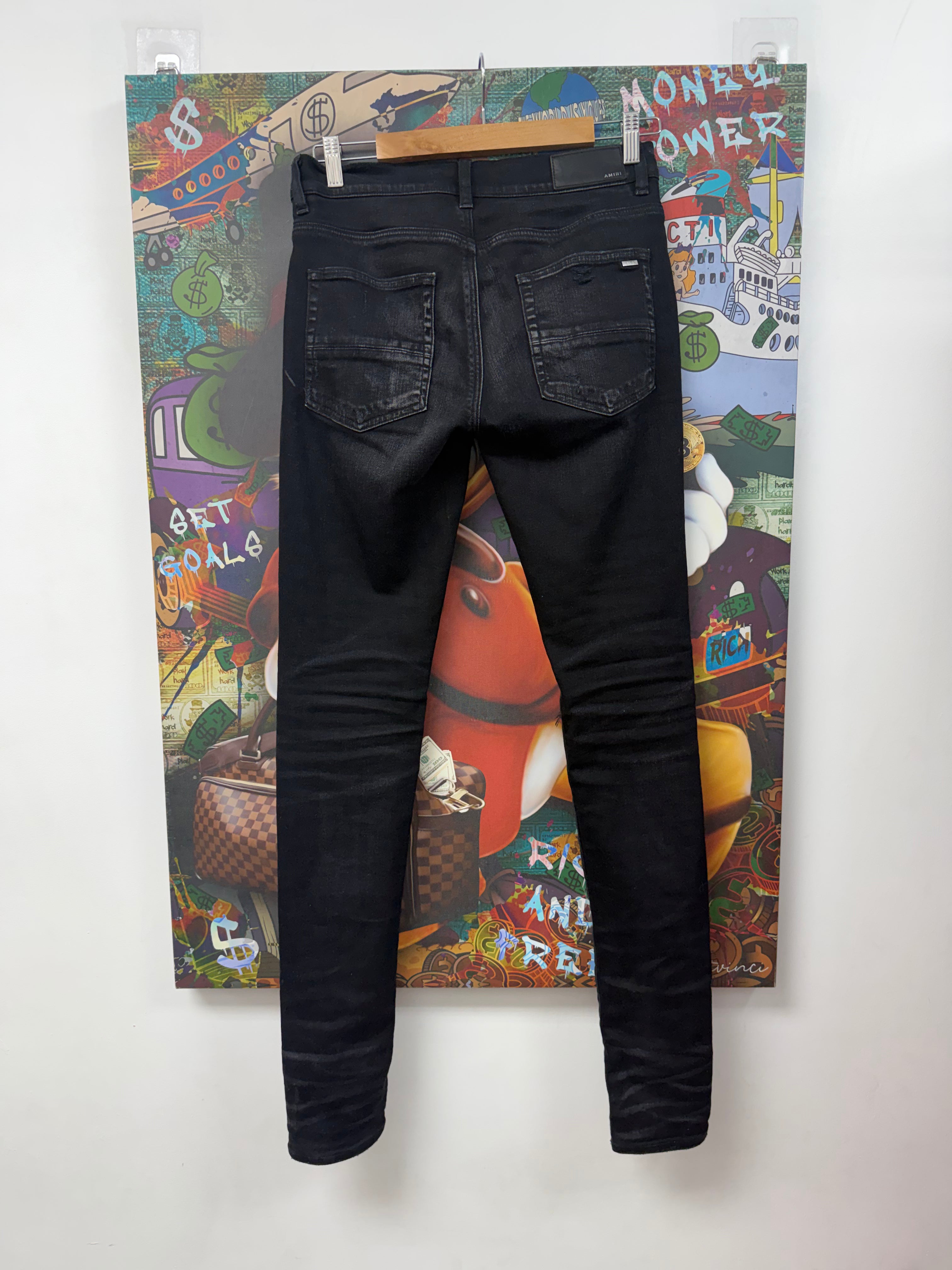 Amiri MX1 Black Wash Red Patch Jeans