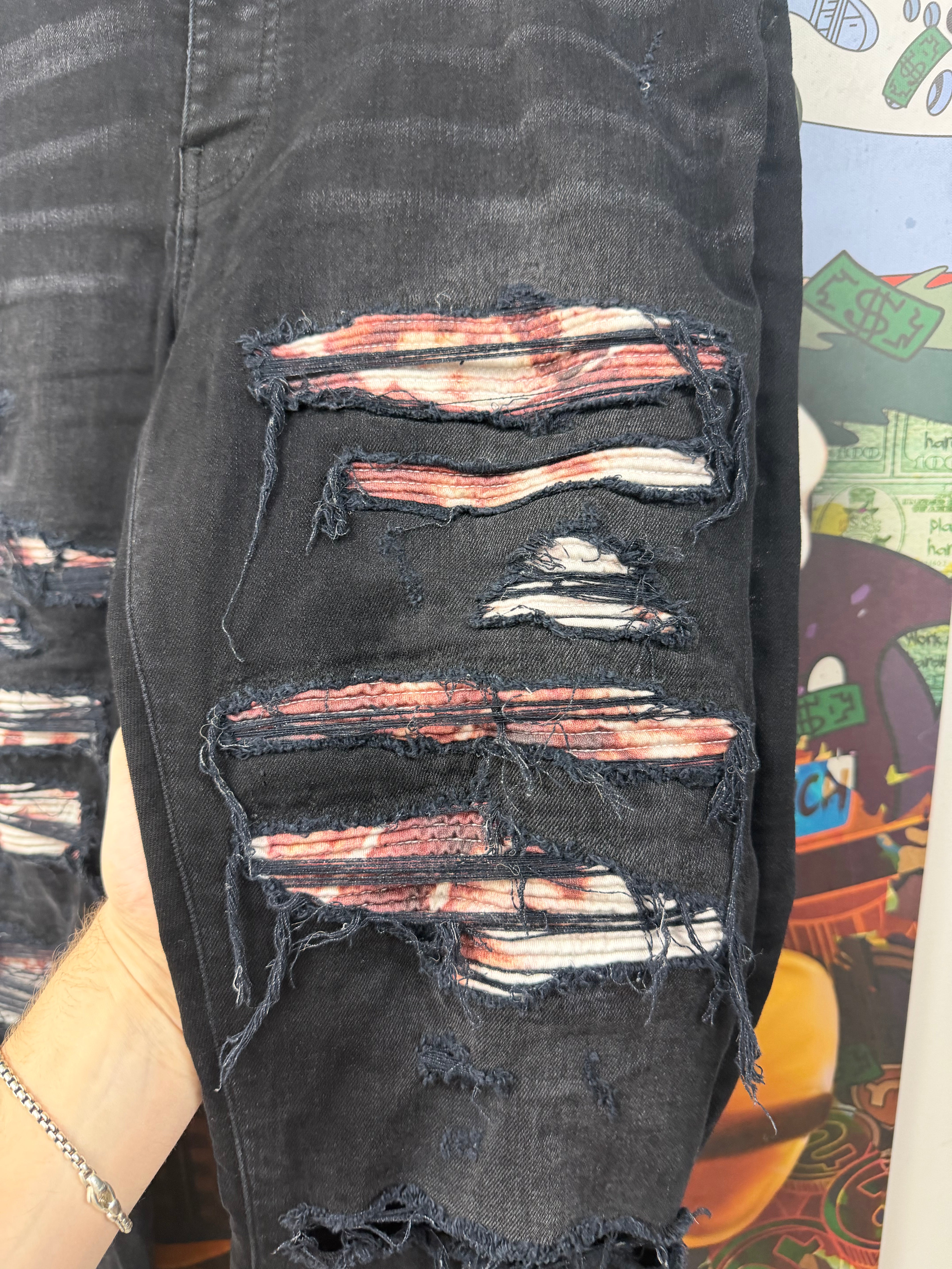 Amiri Black Wash Red Tie Dye Thrasher Patch Jeans