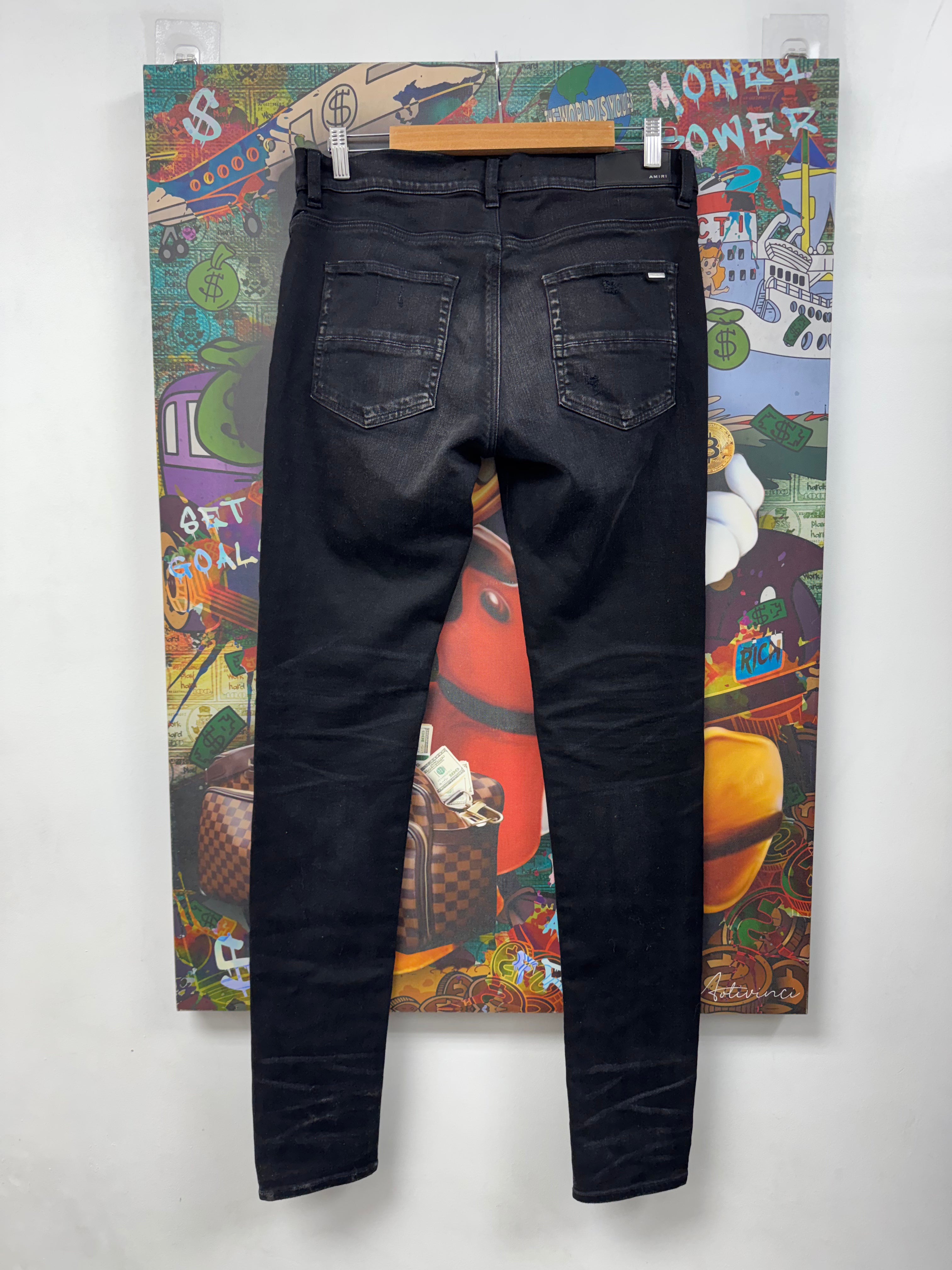 Amiri MX1 Black Wash Red Suede Patch Jeans