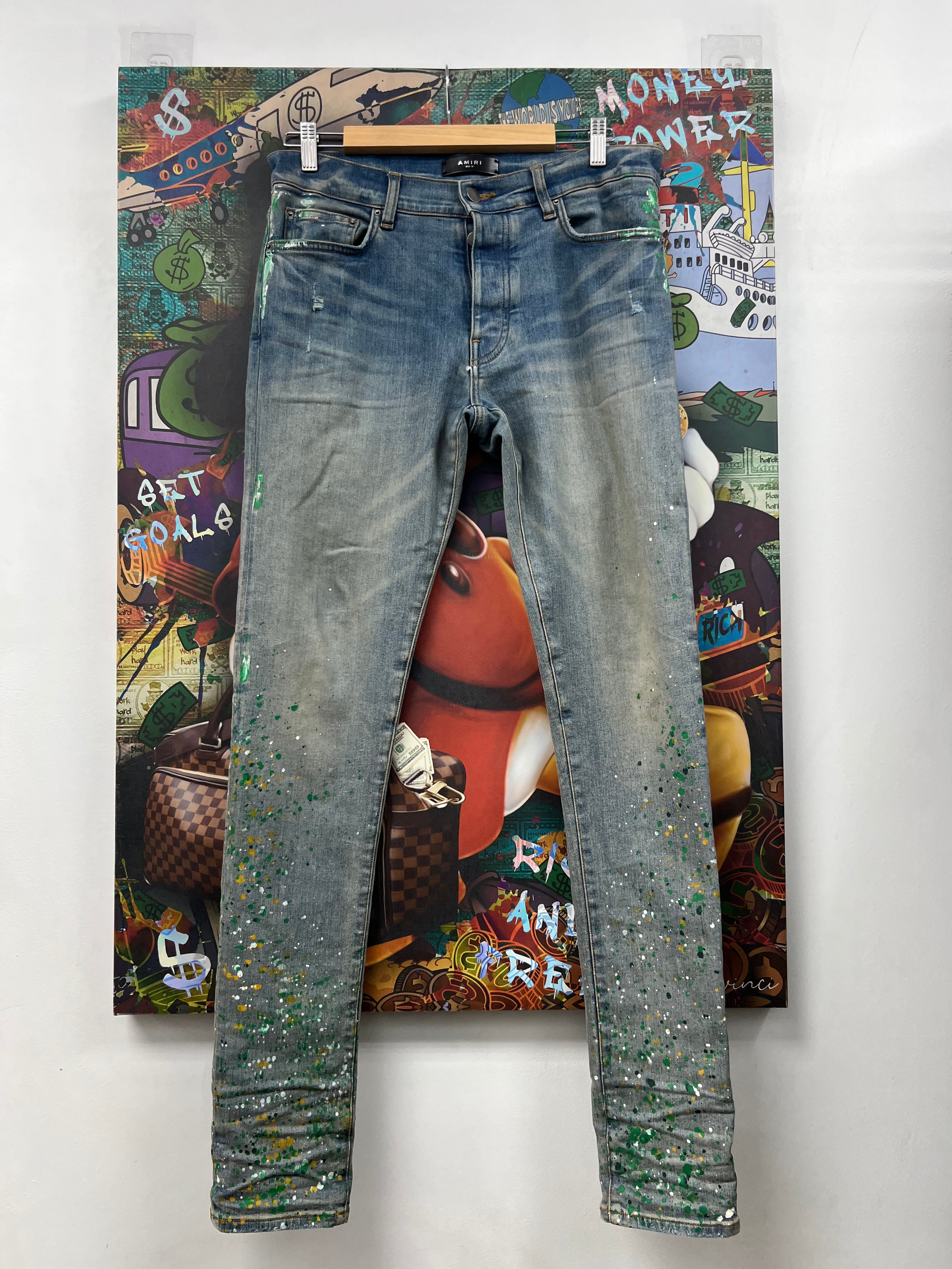 Amiri Light Wash Green Splatter Thrasher Jeans