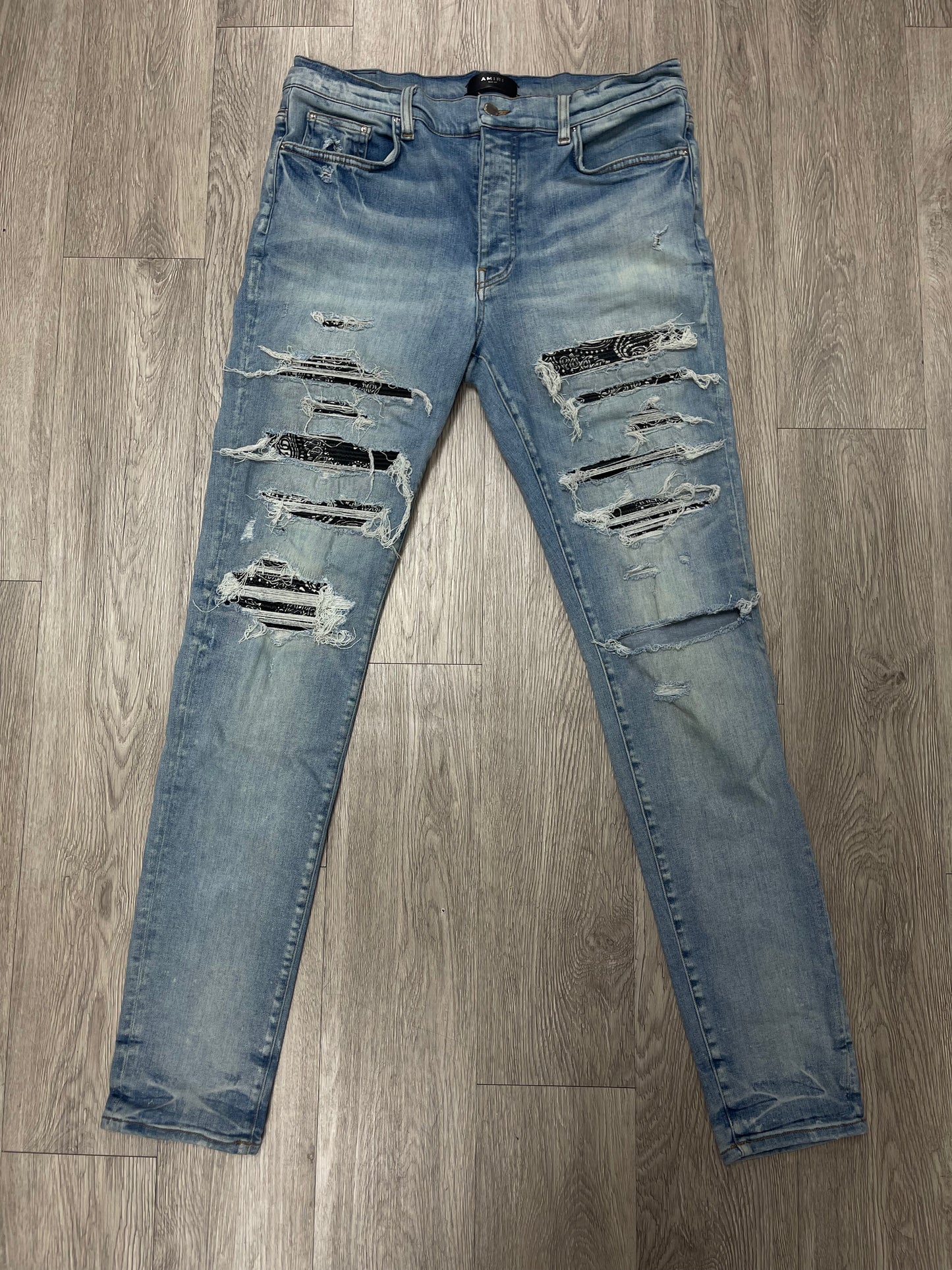 Amiri Light Wash Paisley Thrasher Jeans