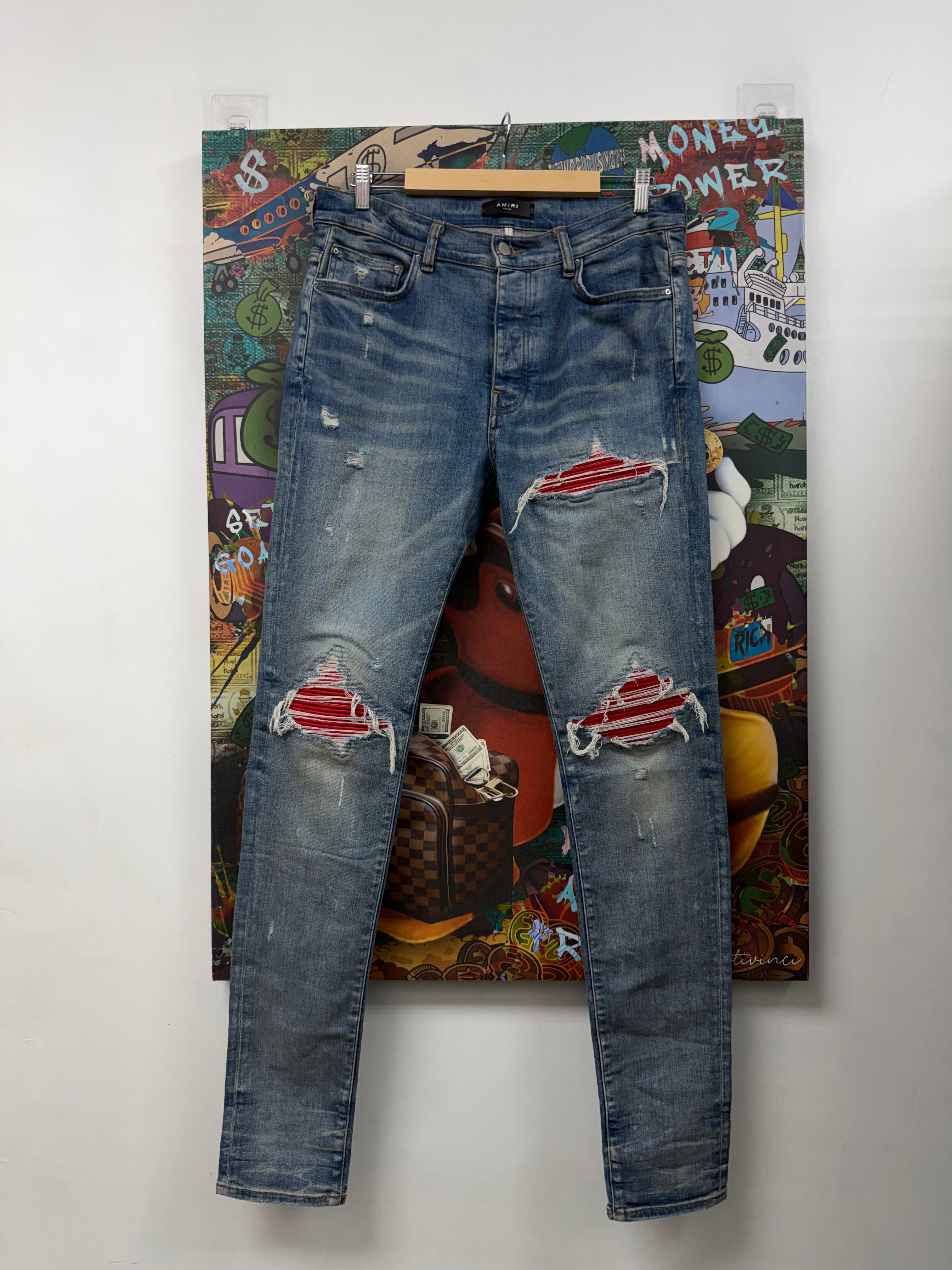 Amiri MX1 Light Wash Red Patch Jeans