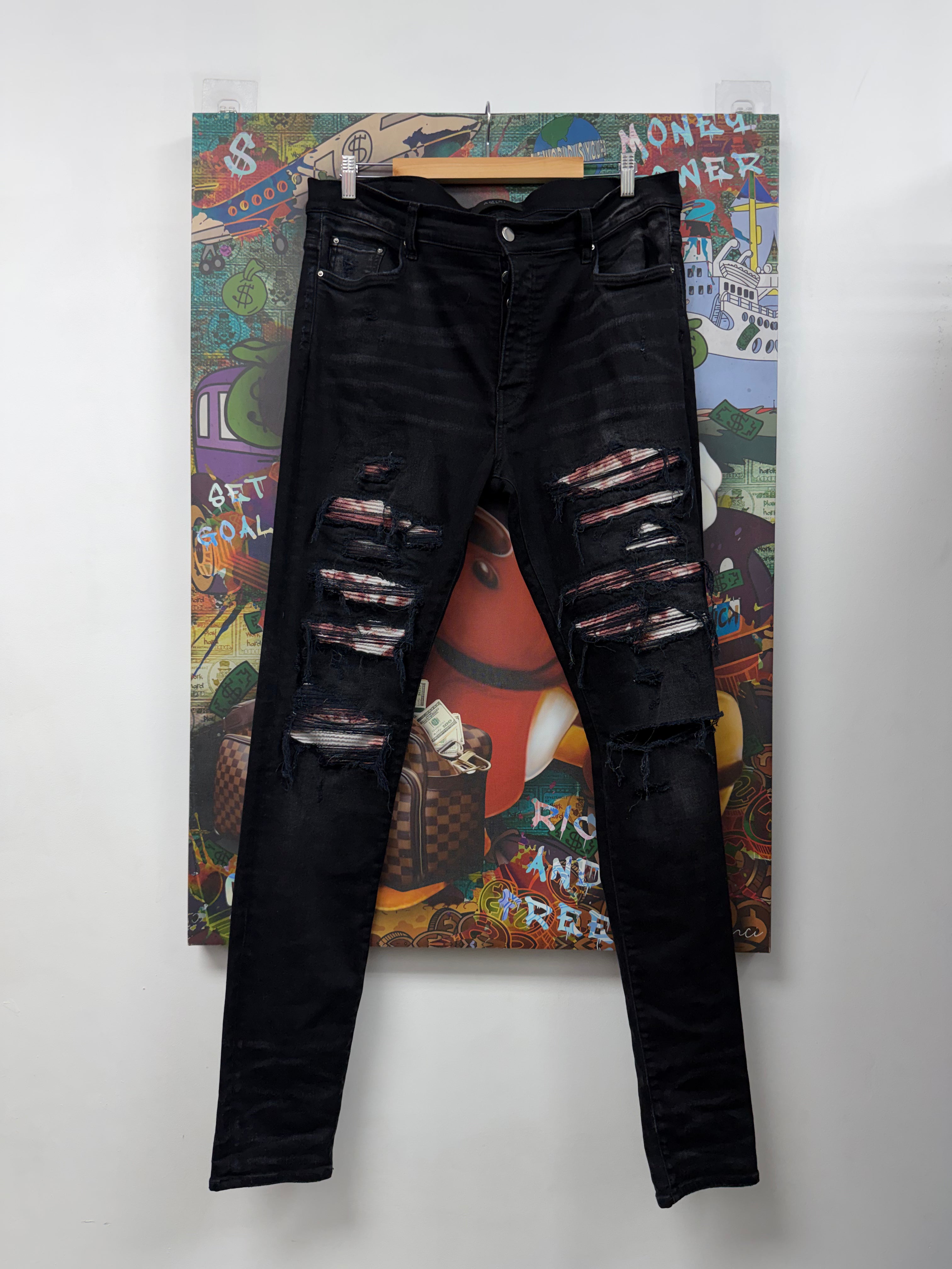 Amiri Black Wash Red White Tie Dye Thrasher Jeans