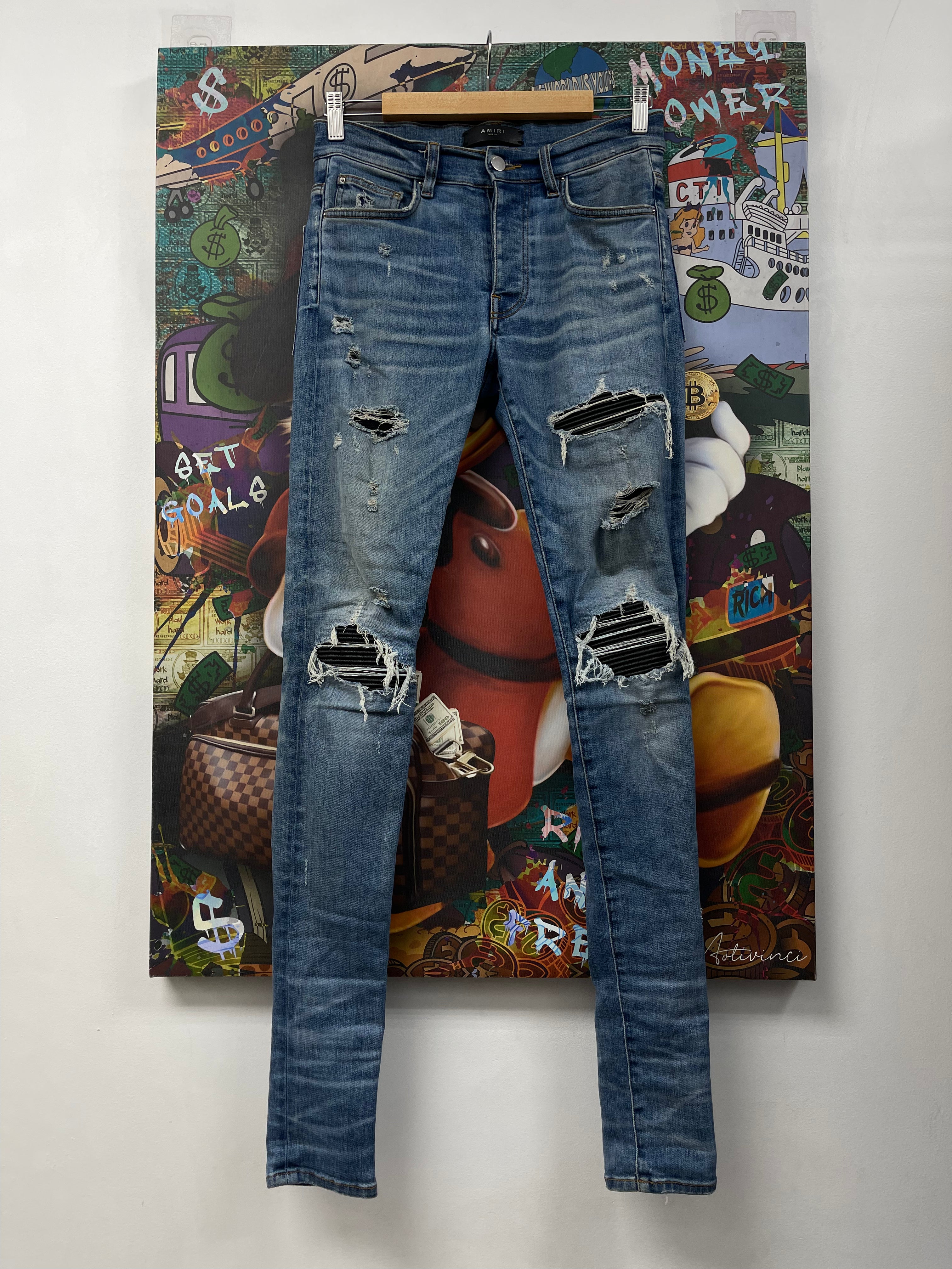 Amiri MX1 Light Wash Black Patch Jeans