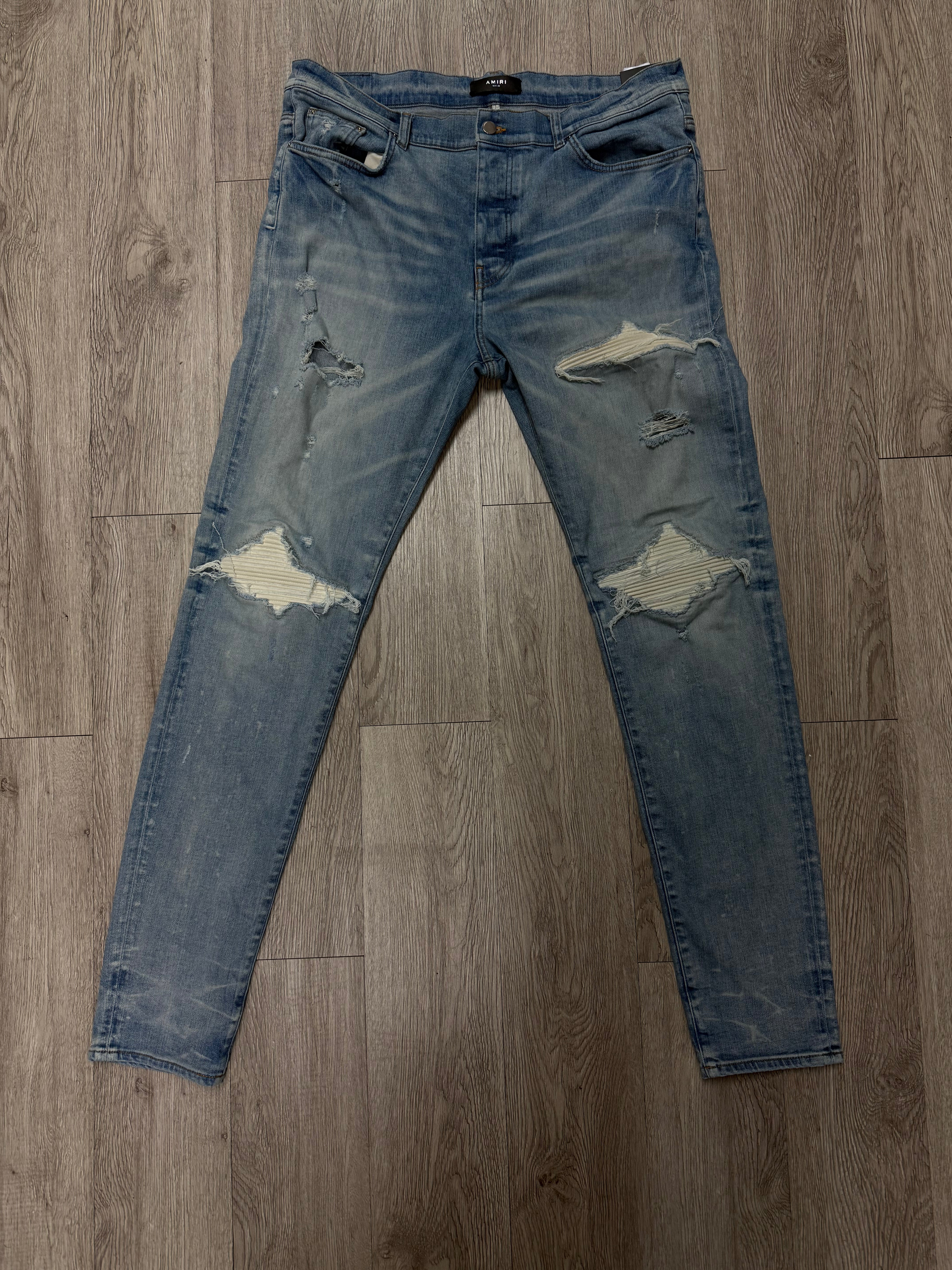 Amiri MX1 Light Wash White Patch Jean
