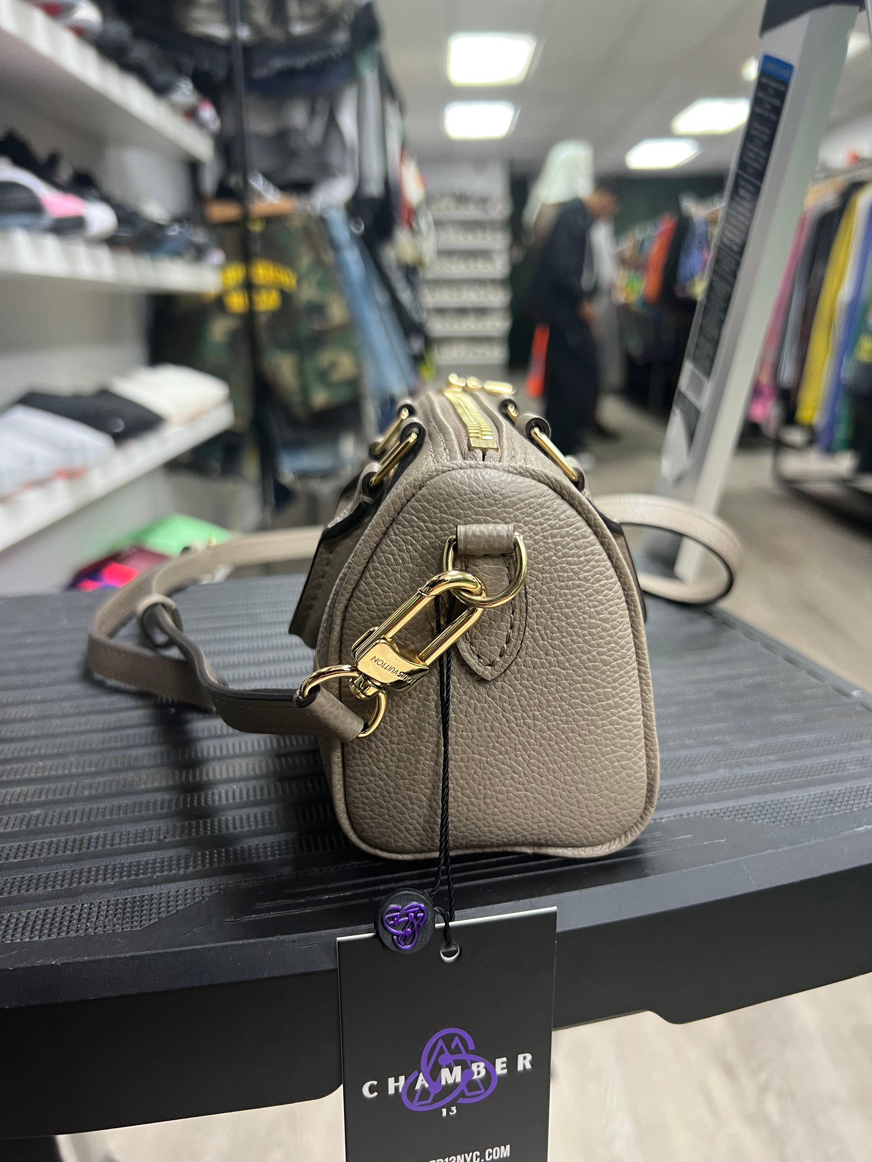 Louis Vuitton Speedy Empreinte Leather Bag