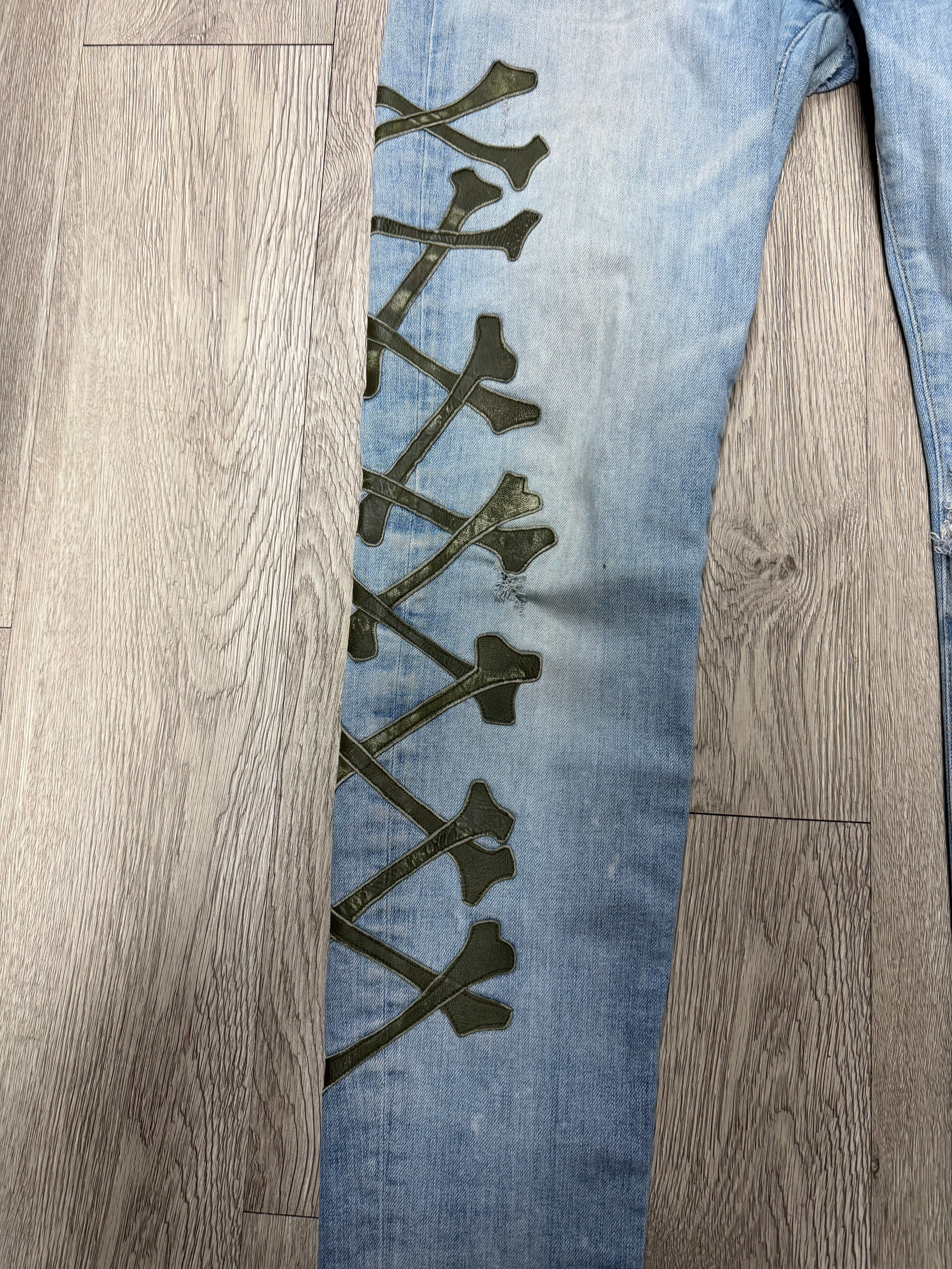 Amiri Light Wash Camo Bones Jeans