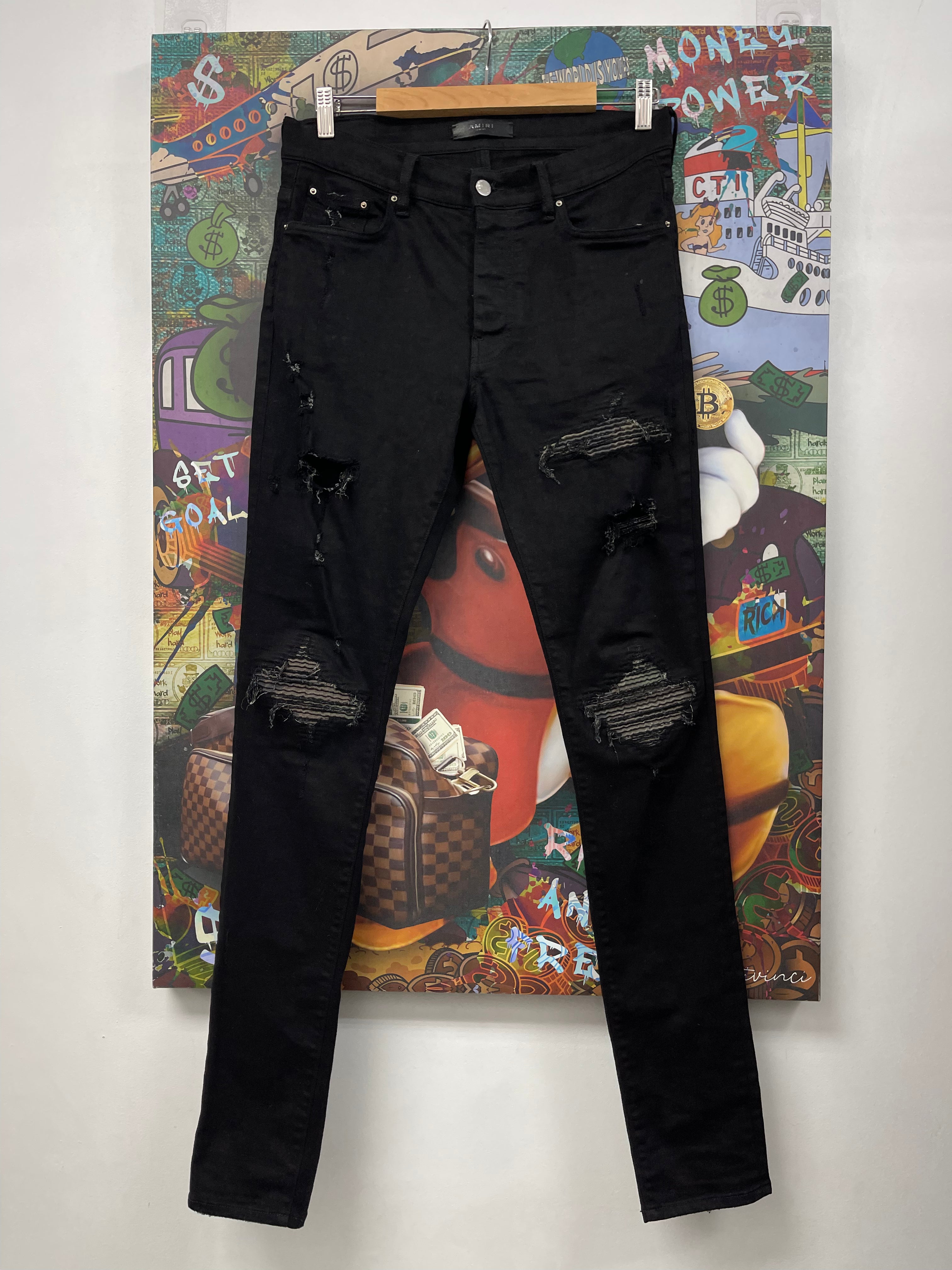 Amiri MX1 Black Camo Patch Jeans
