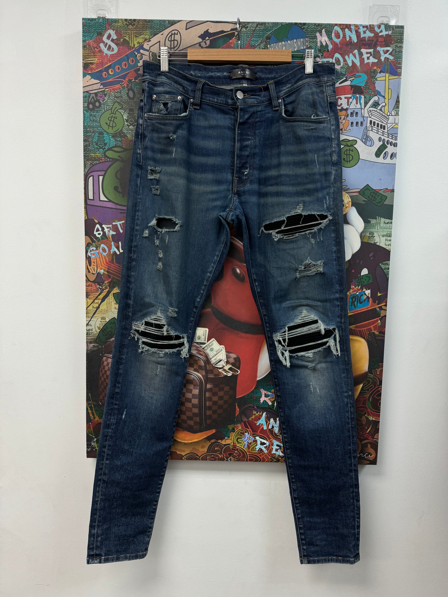 Amiri MX1 Light Wash Black Patch Jeans