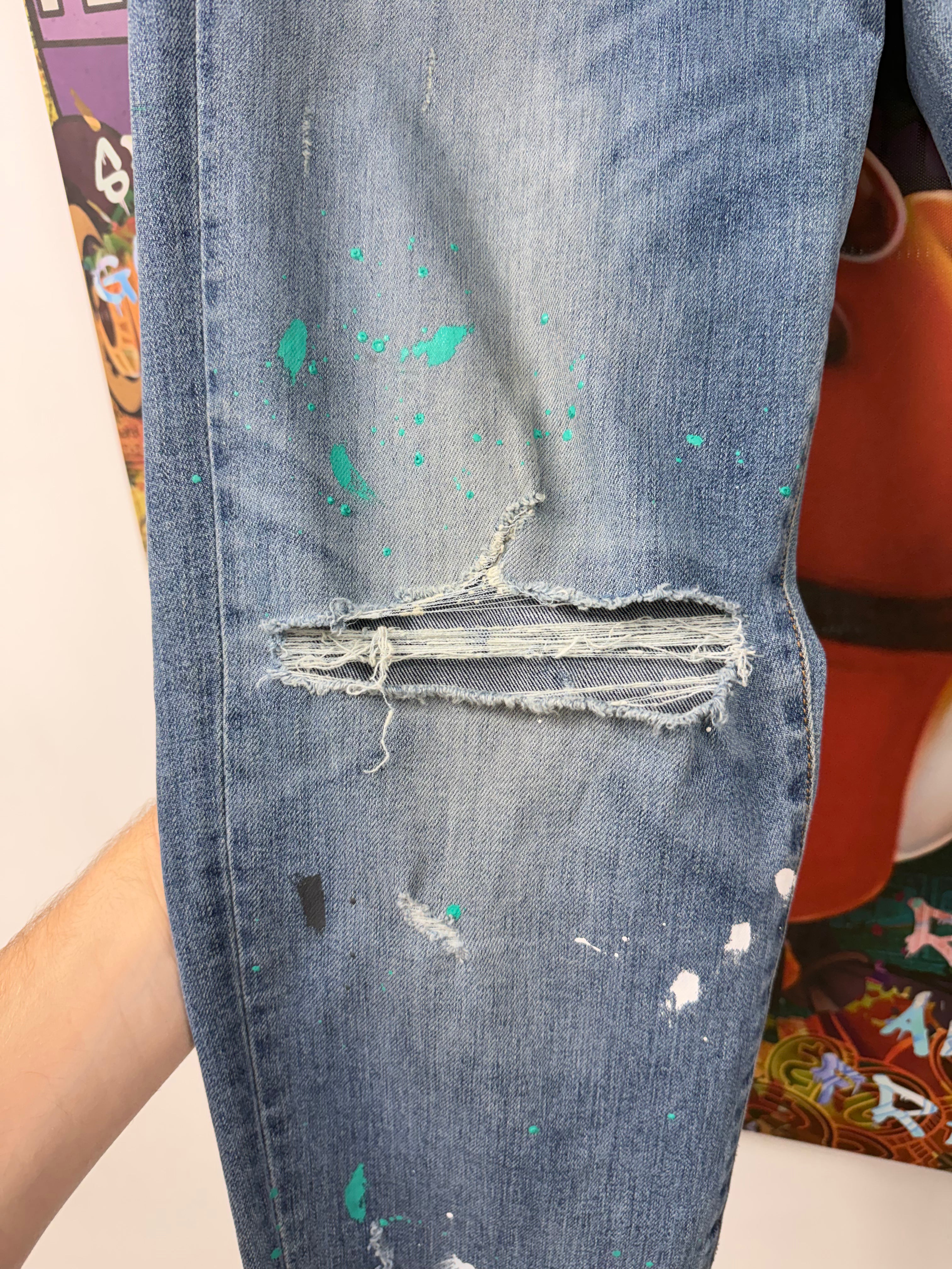 Amiri Light Wash Teal Splatter Ripped Jeans