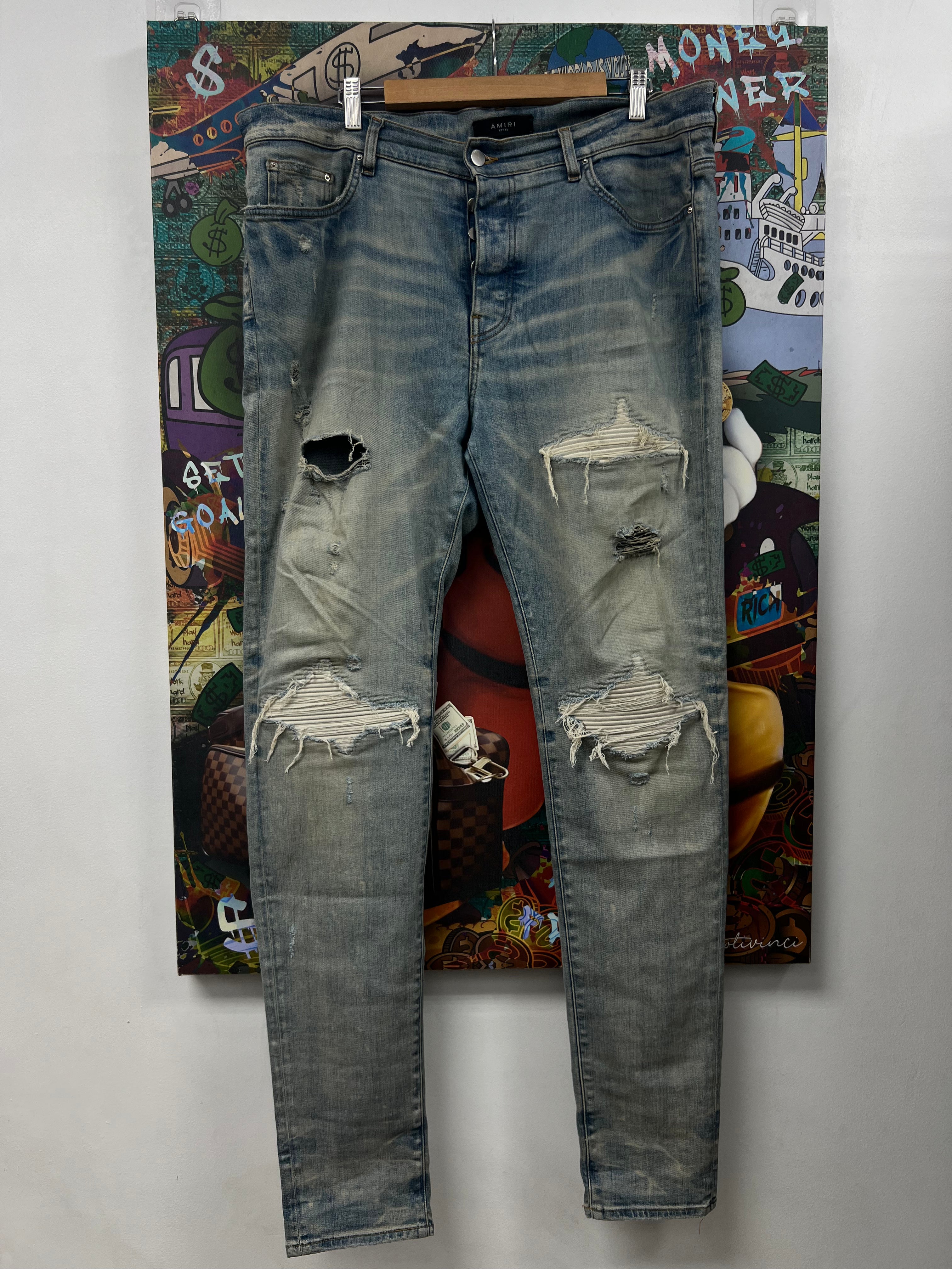 Amiri MX1 Light Wash White Patch Jeans