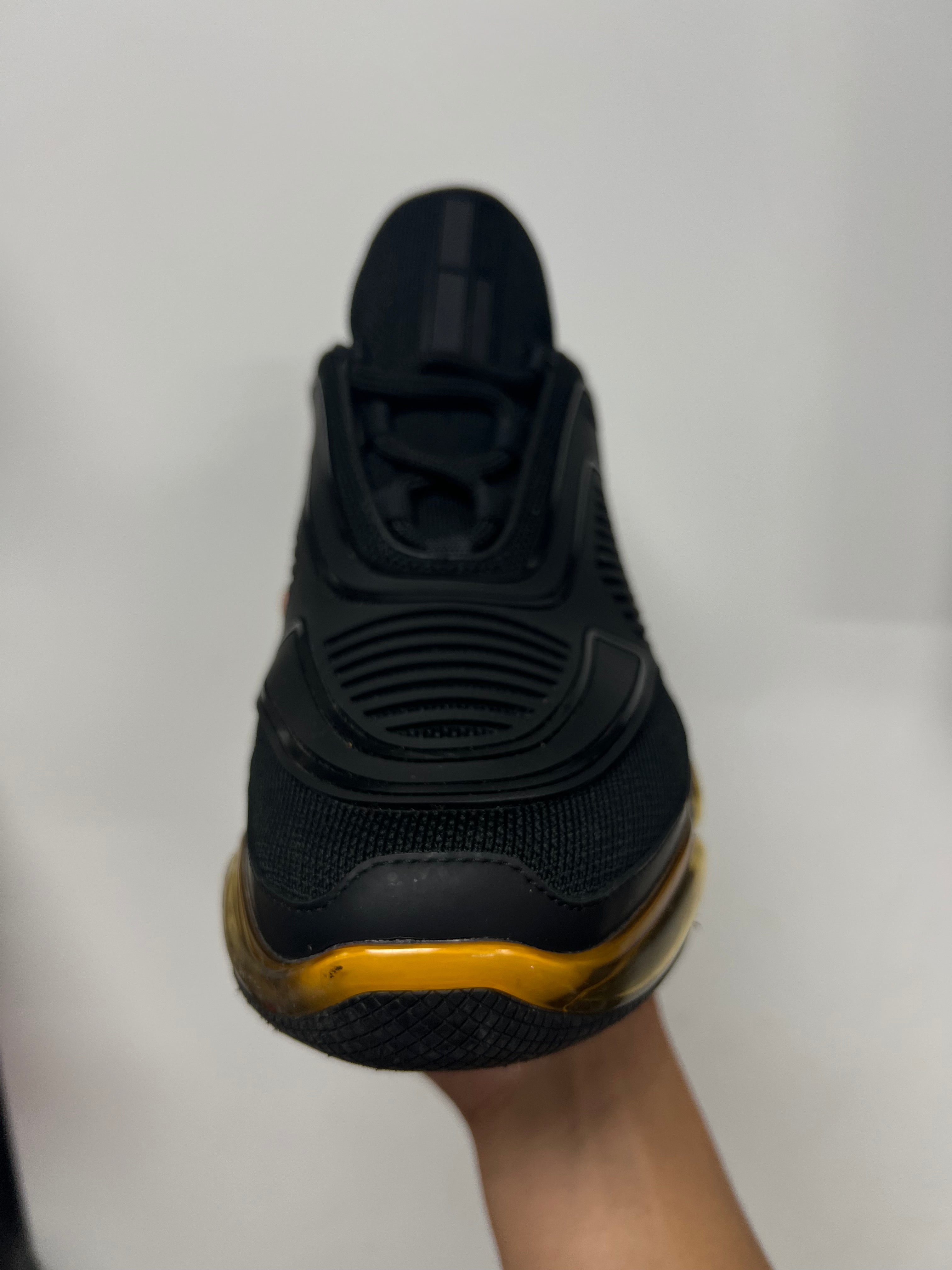 Prada Black Gold Cloudbust Sneakers