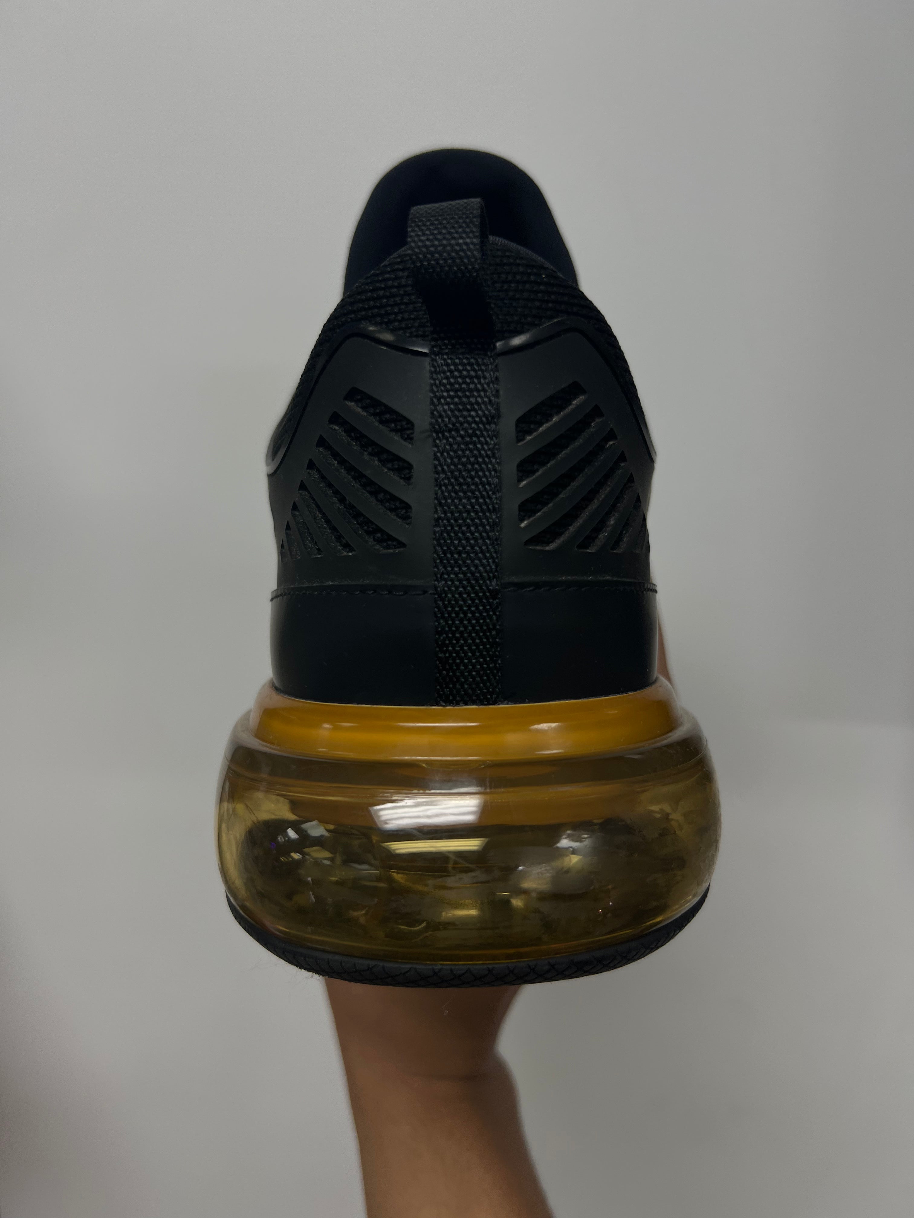 Prada Black Gold Cloudbust Sneakers