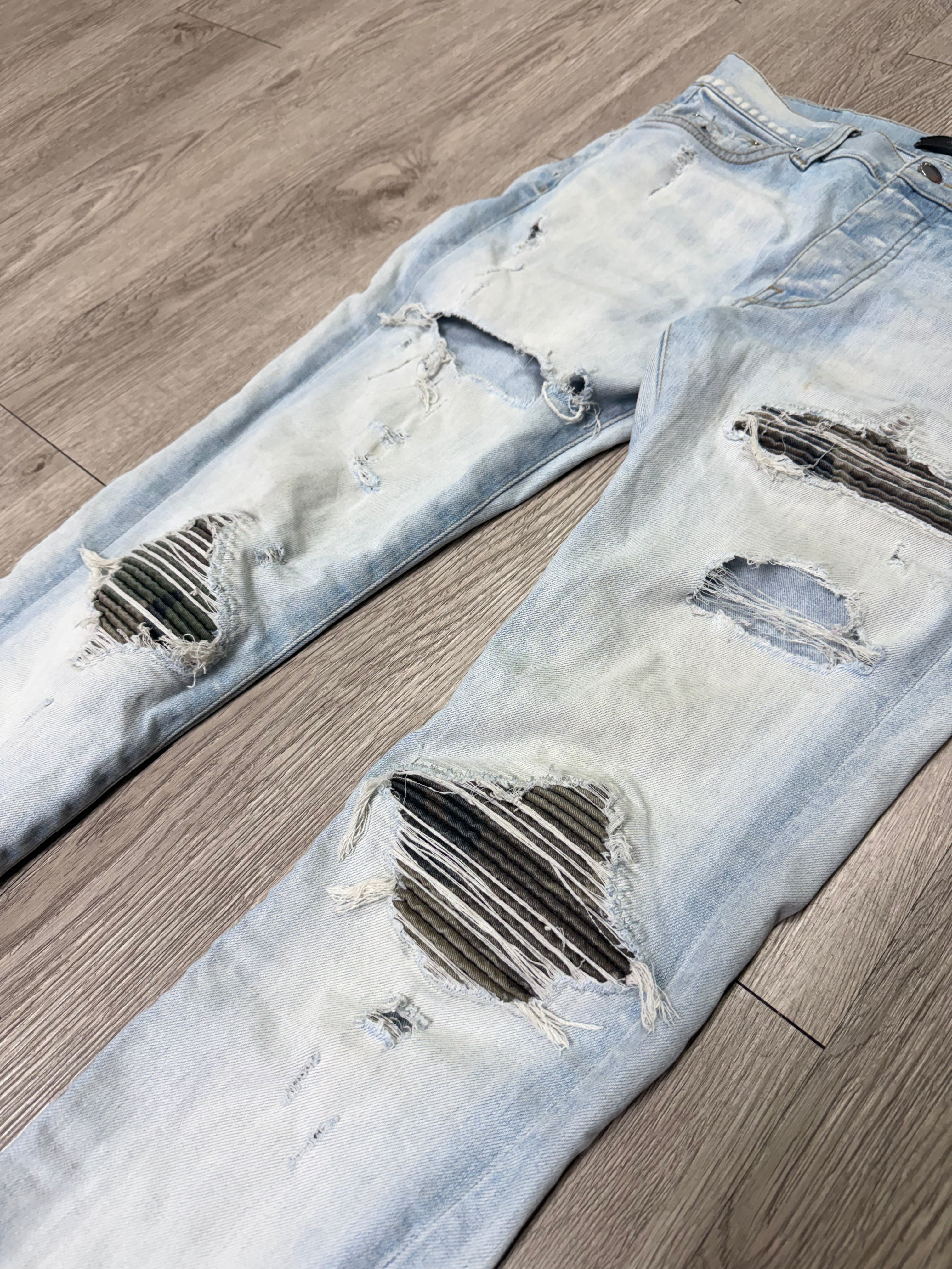 Amiri MX1 Light Wash Camo Patch Jeans