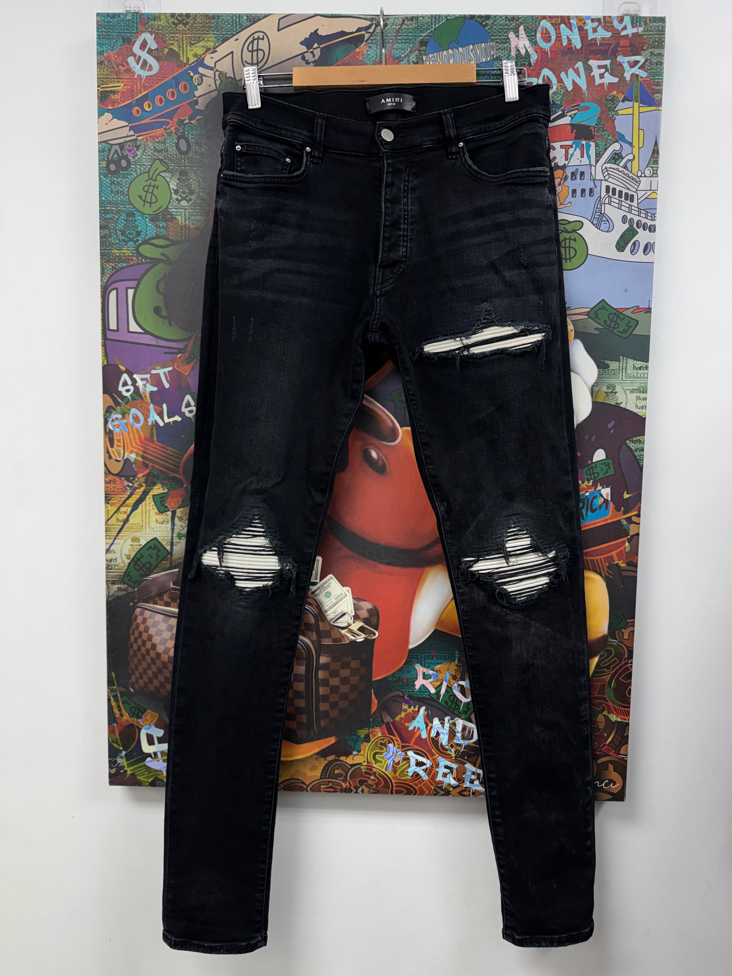 Amiri MX1 Black Wash White Patch Jeans