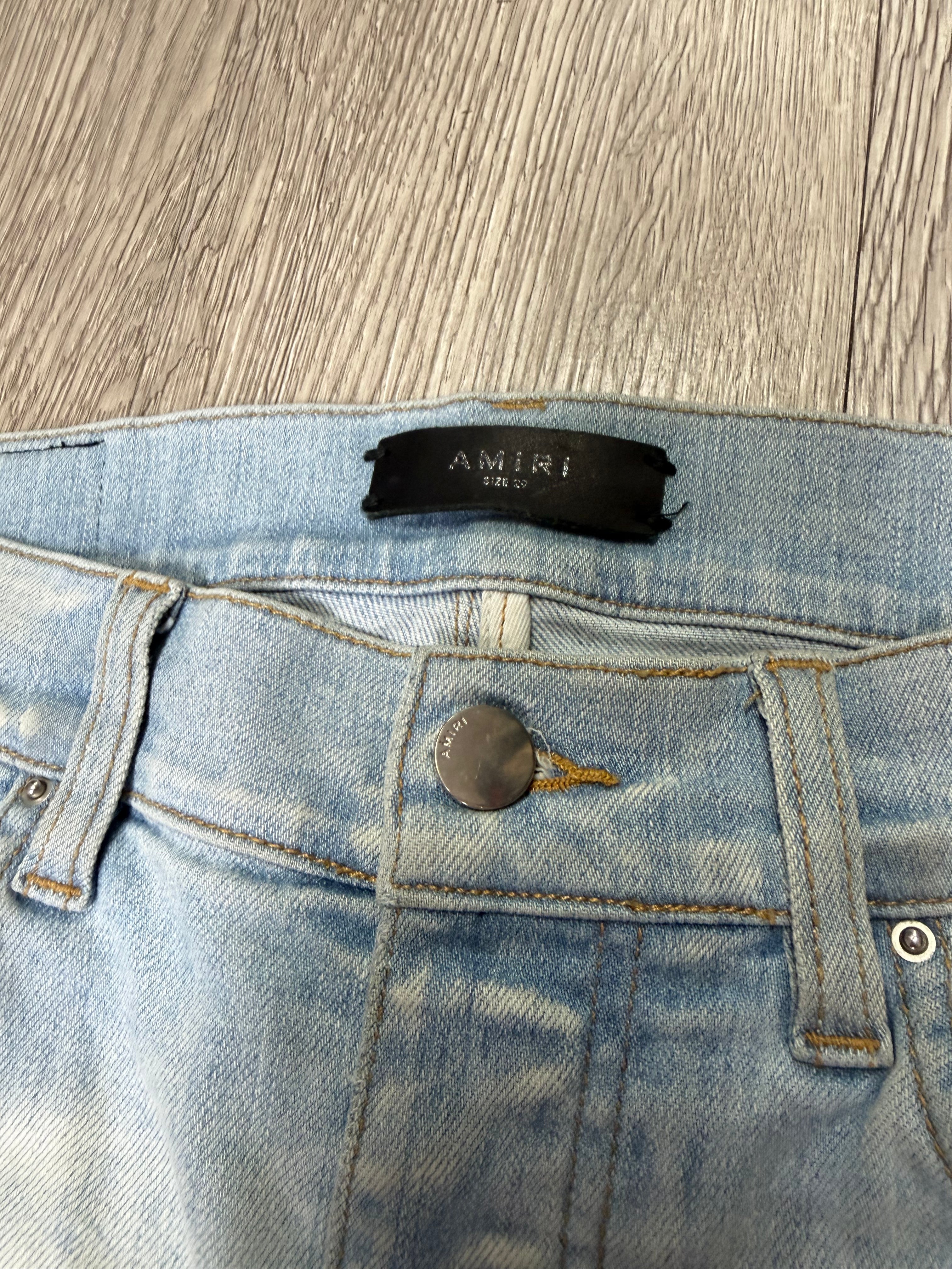 Amiri MX1 Light Wash Camo Patch Jeans