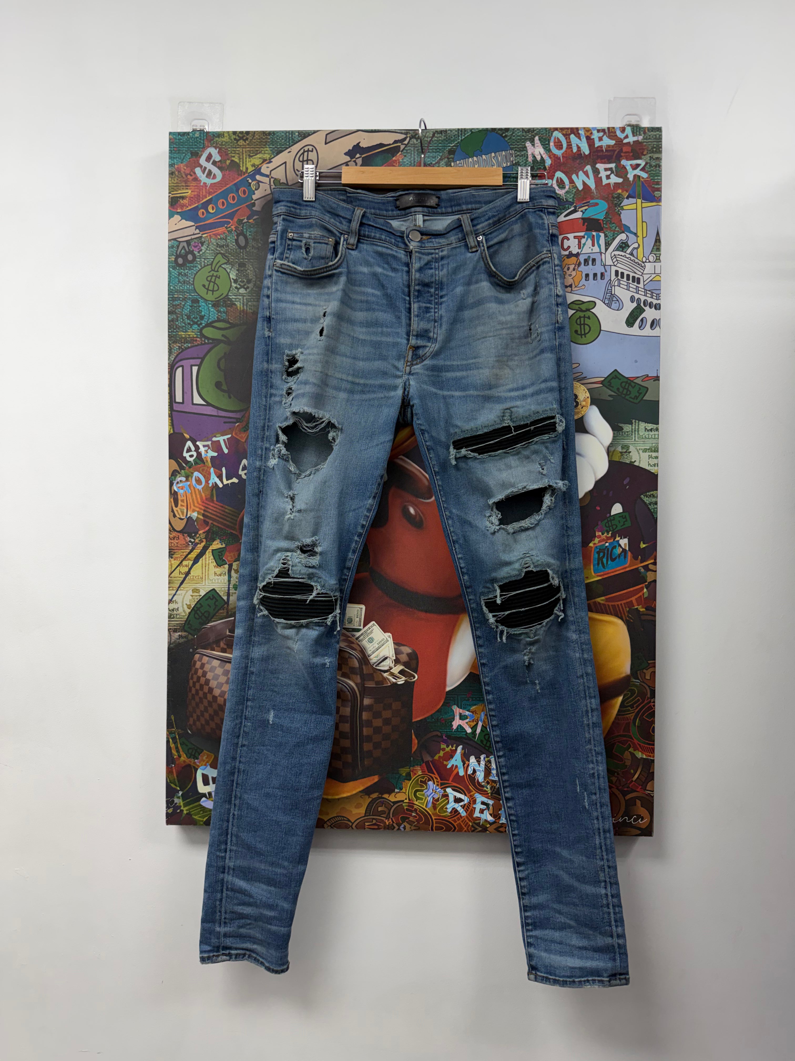 Amiri MX1 Light Wash Black Suede Patch Jeans