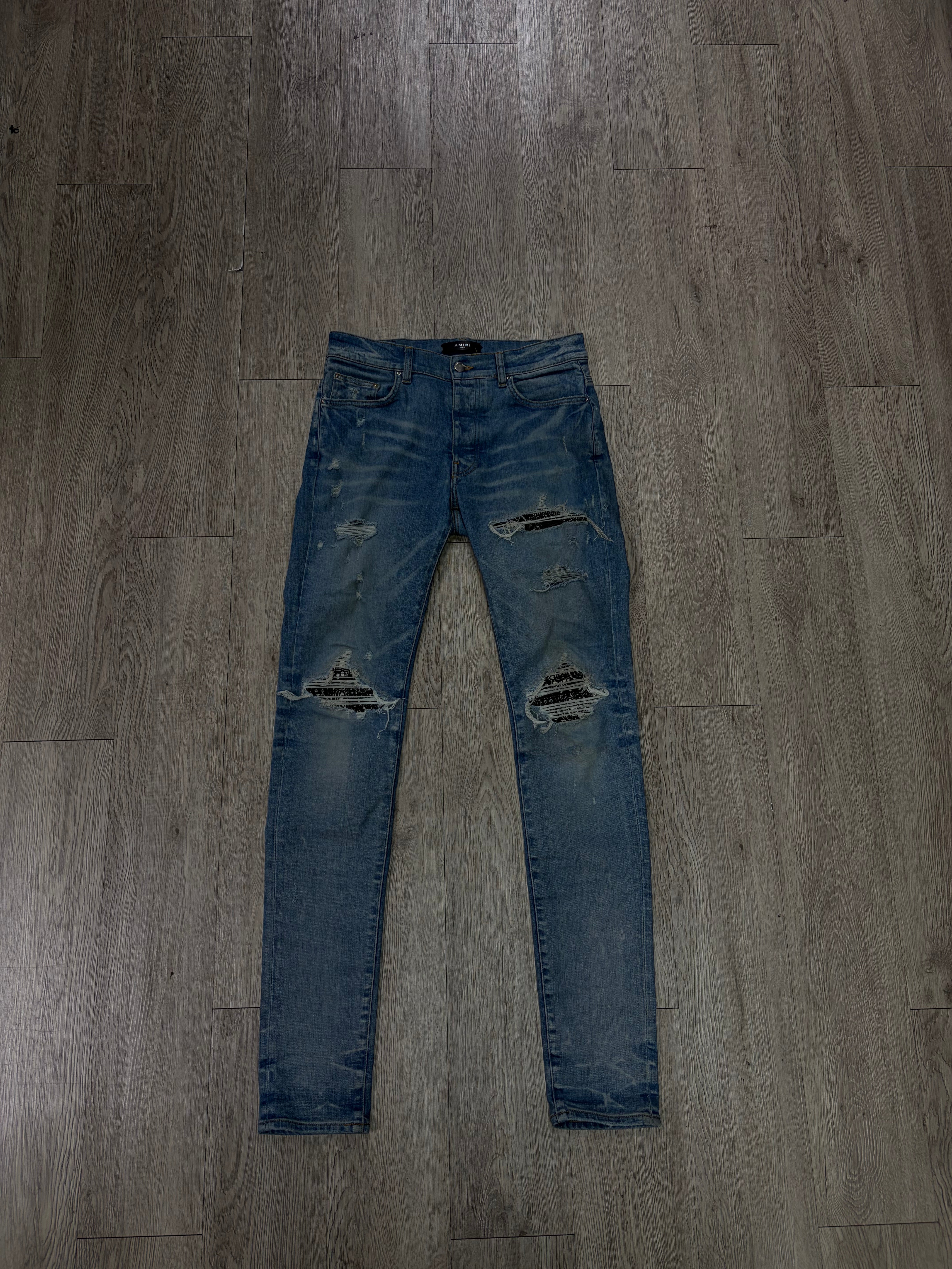 Amiri MX1 Light Wash Black Paisley Patch Jeans
