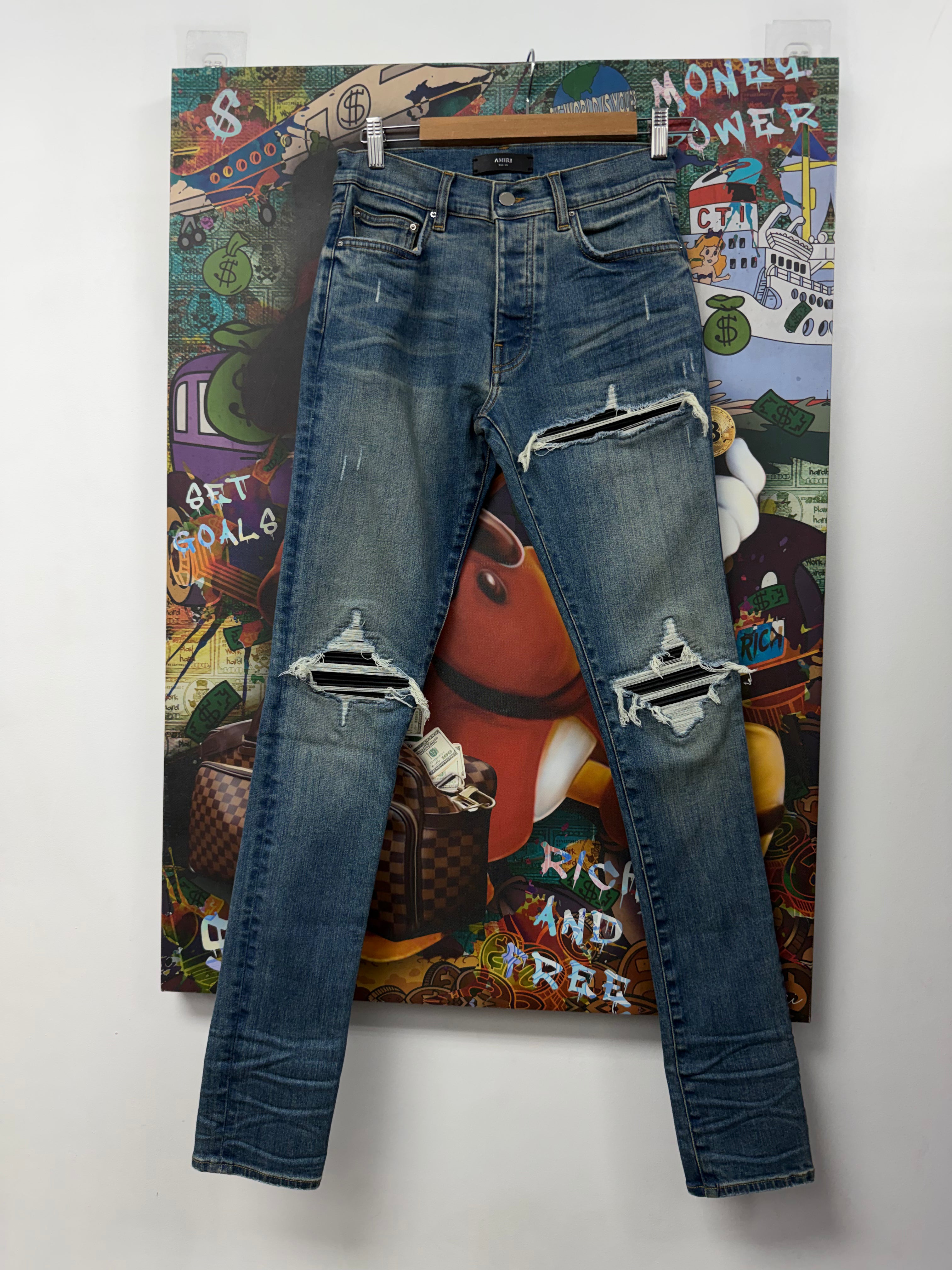 Amiri MX1 Light Wash Black Patch Jeans