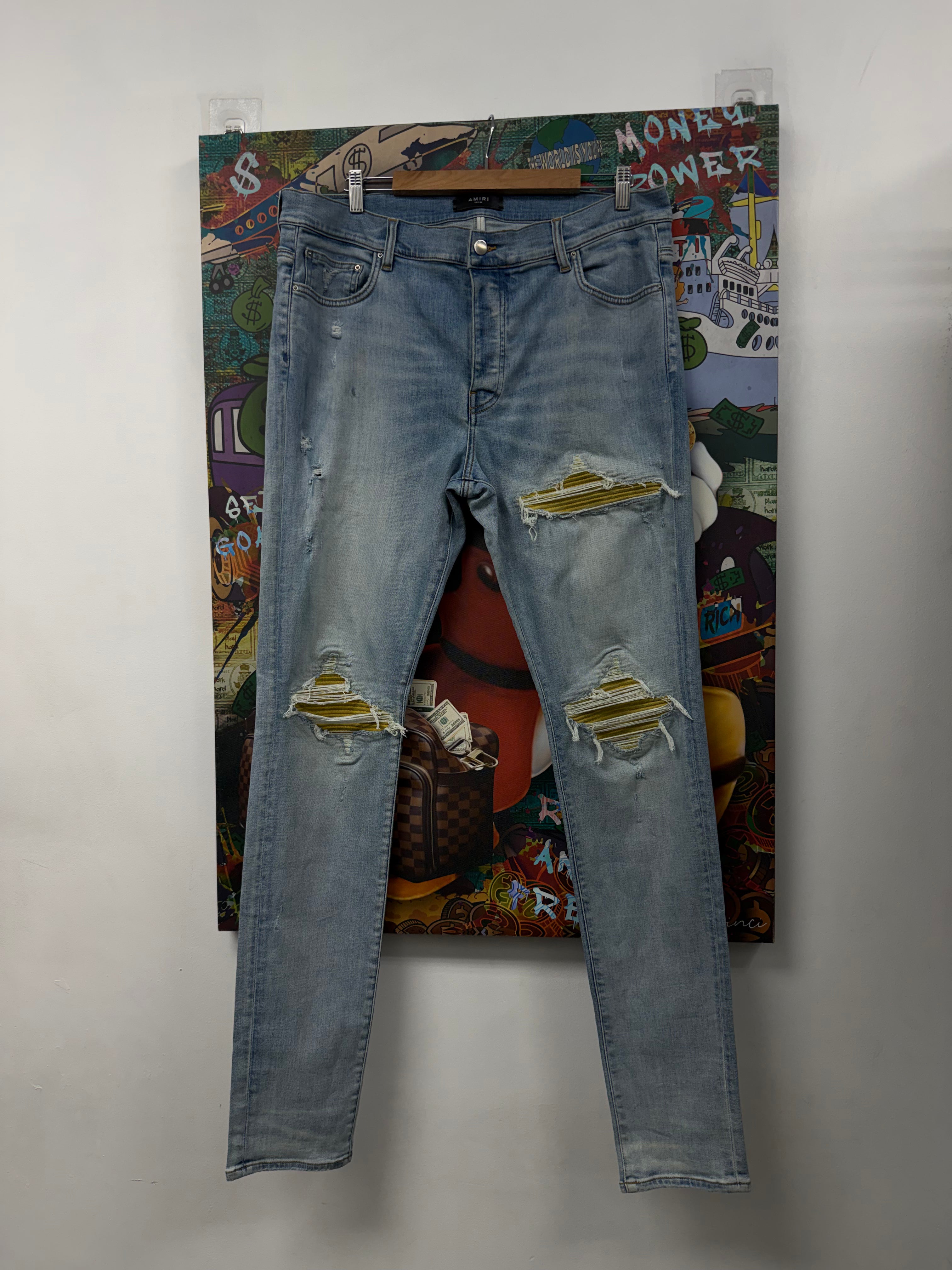 Amiri MX1 Light Wash Yellow Suede Patch Jeans