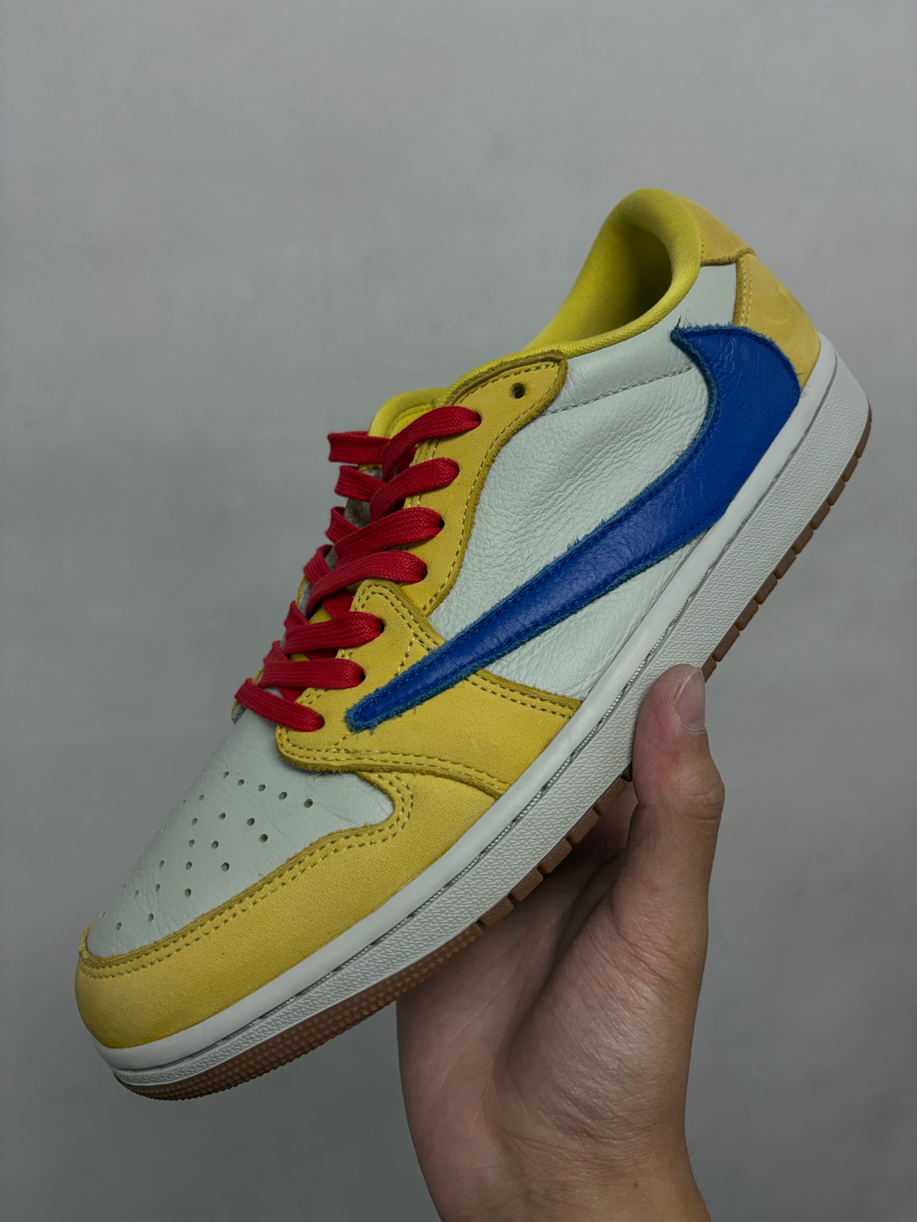 Jordan 1 Low Travis Scott Canary Yellow Sneakers