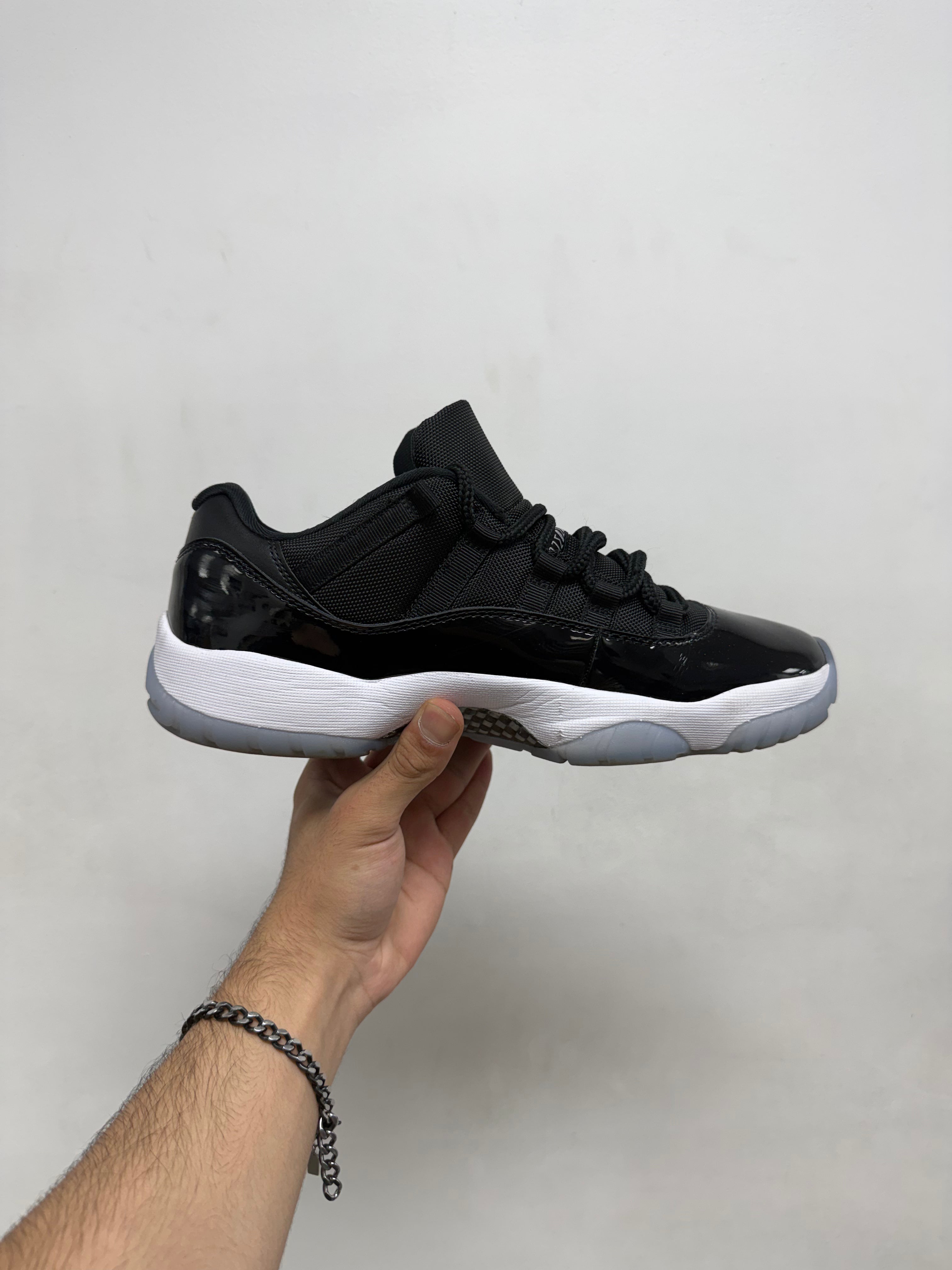 Jordan 11 Low Space Jam Sneakers