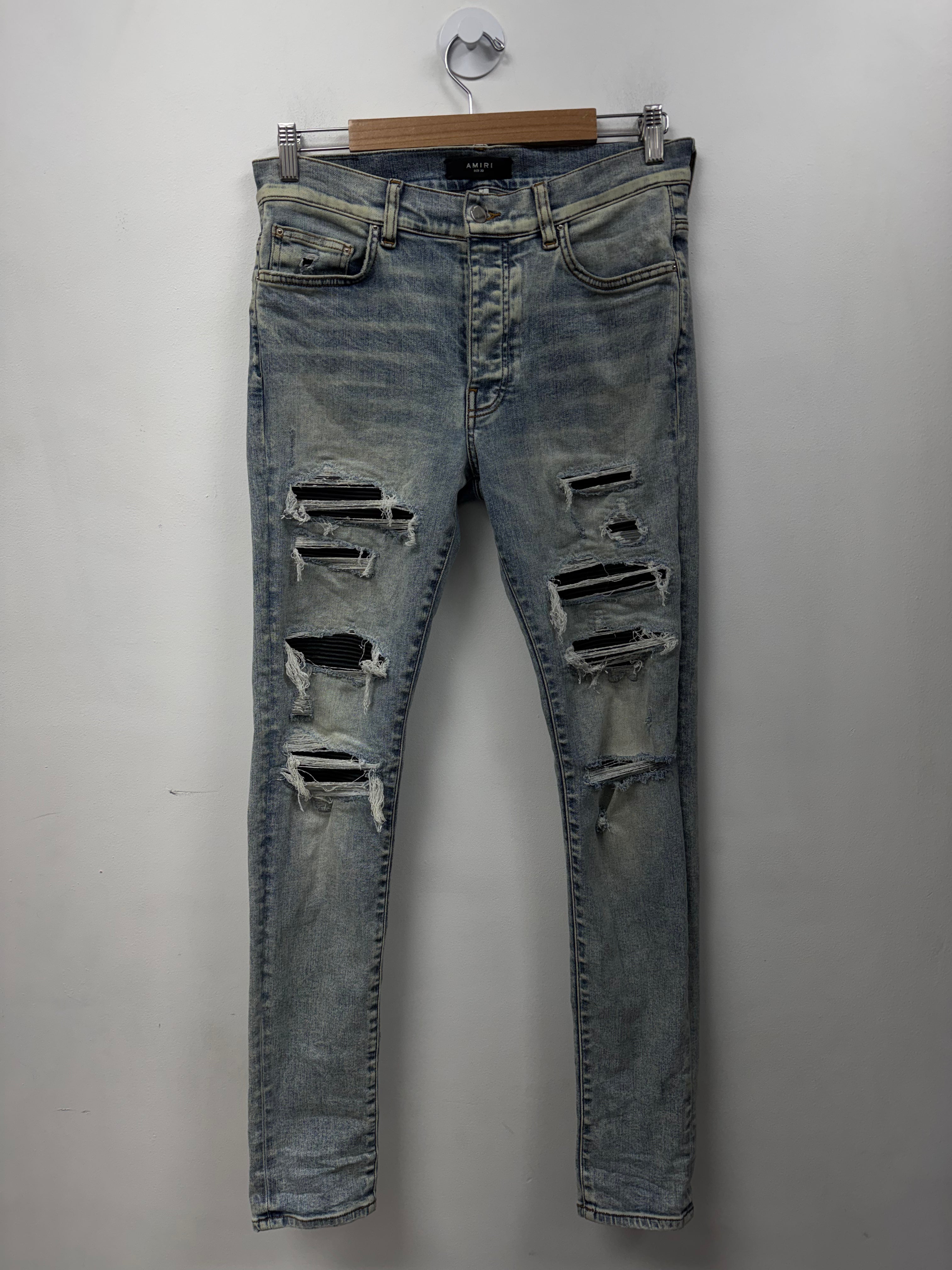 Amiri Stone Wash Black Thrasher Patch Jeans