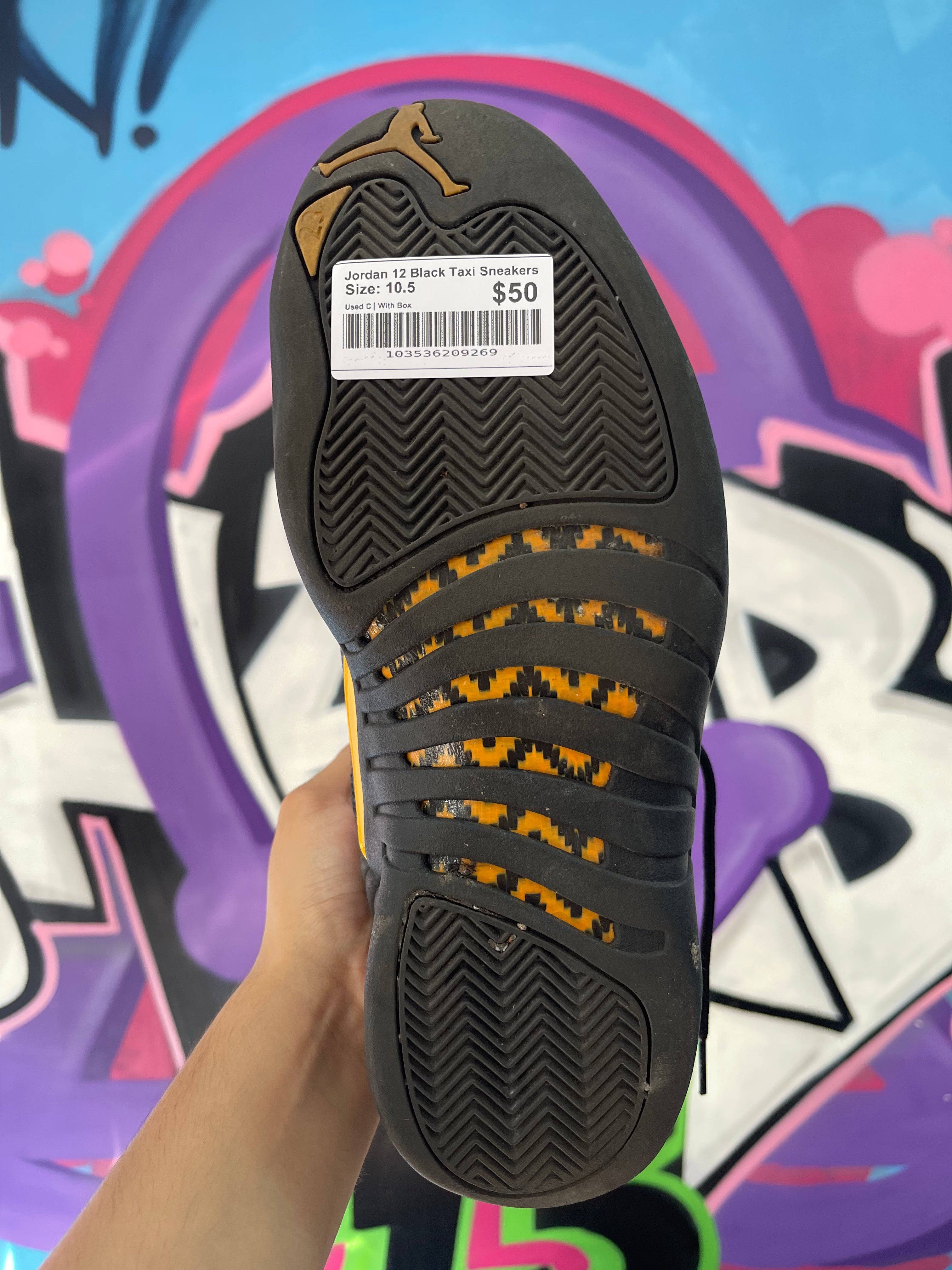 Jordan 12 Black Taxi Sneakers