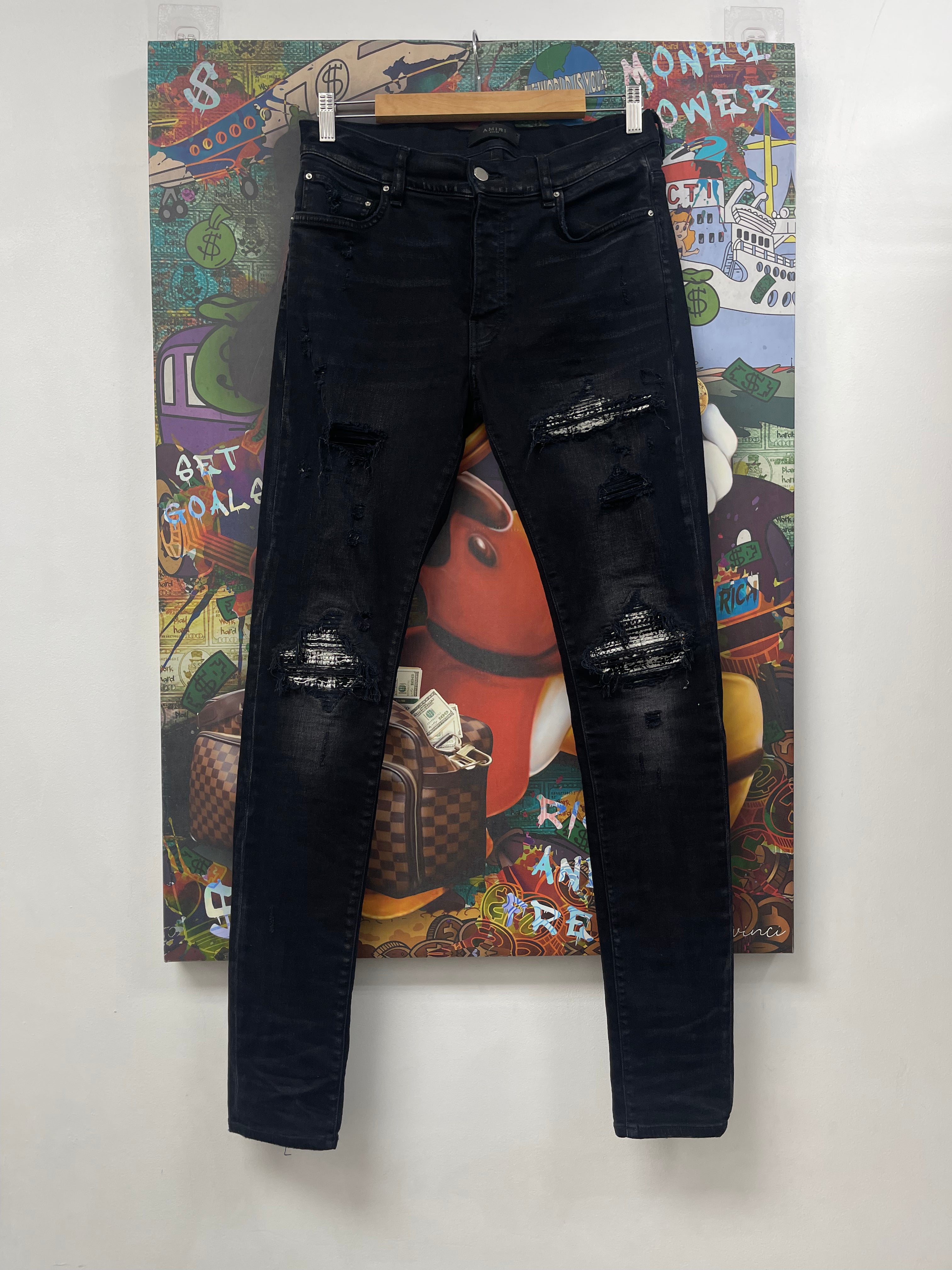 Amiri MX1 Black Wash Boucle Patch Jeans
