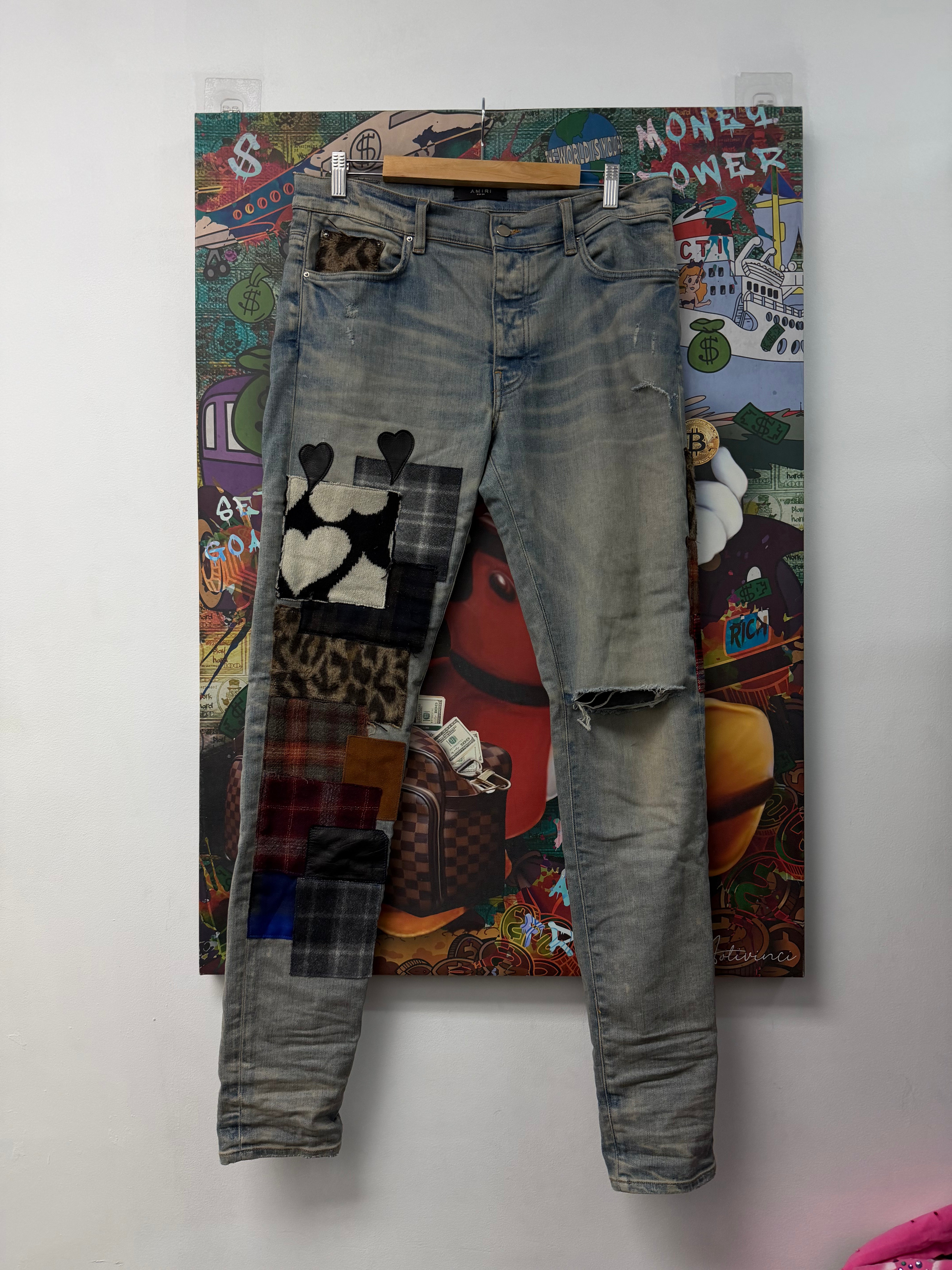 Amiri Light Wash Patchwork Jeans