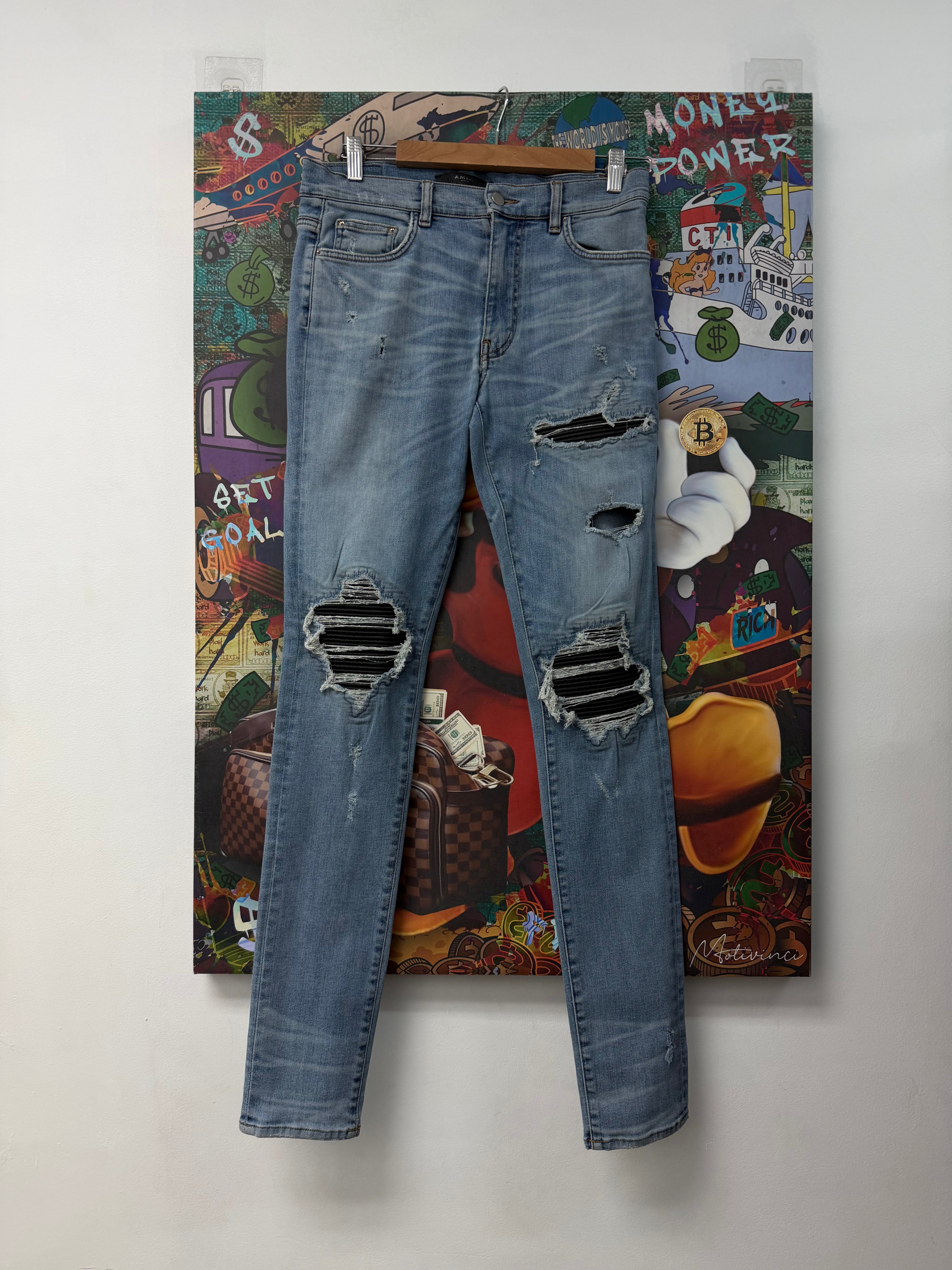 Amiri Light Wash Black Patch MX1 (Repaired) Jeans