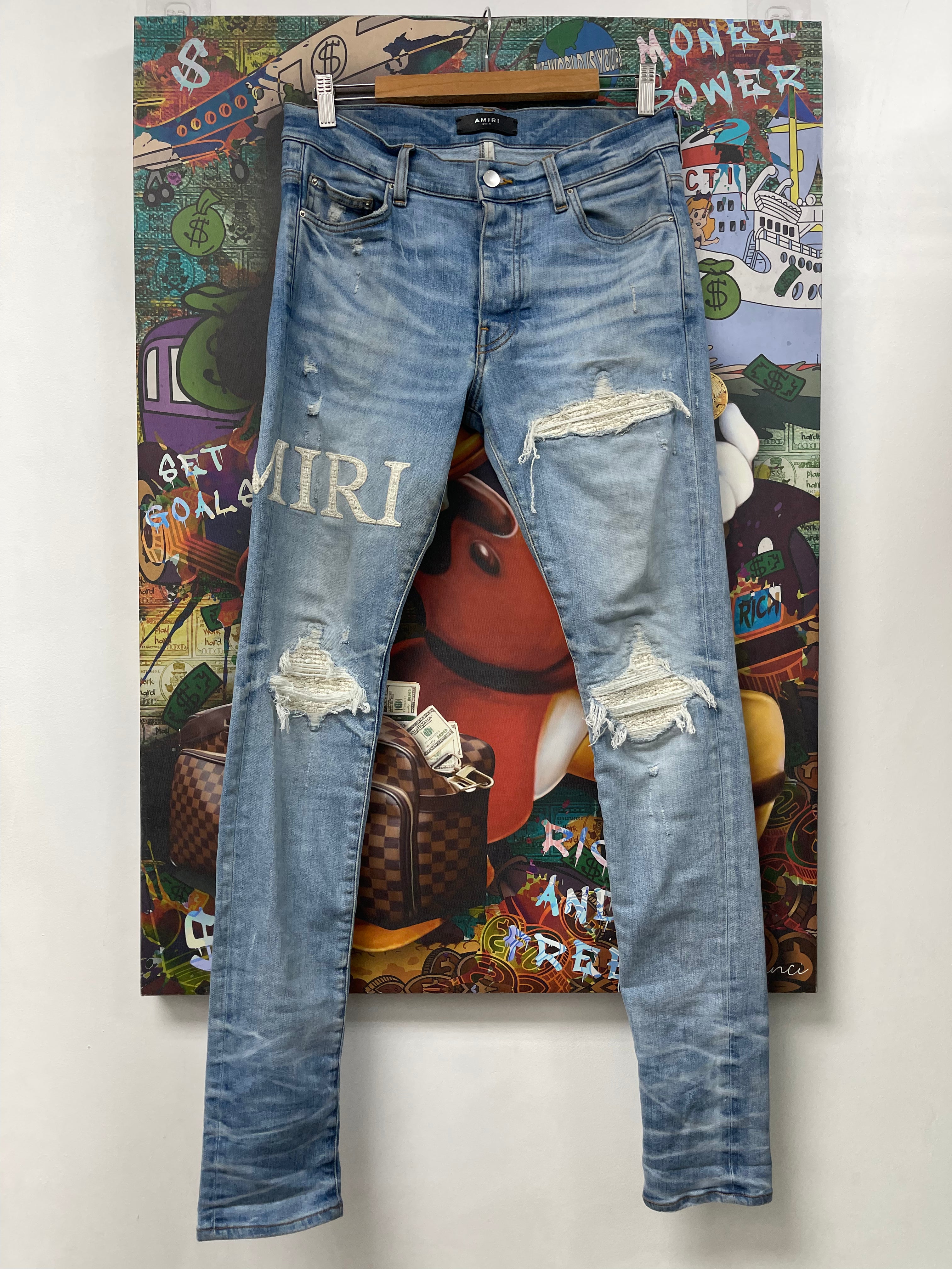 Amiri Light Wash White Boucle Side Logo Jeans