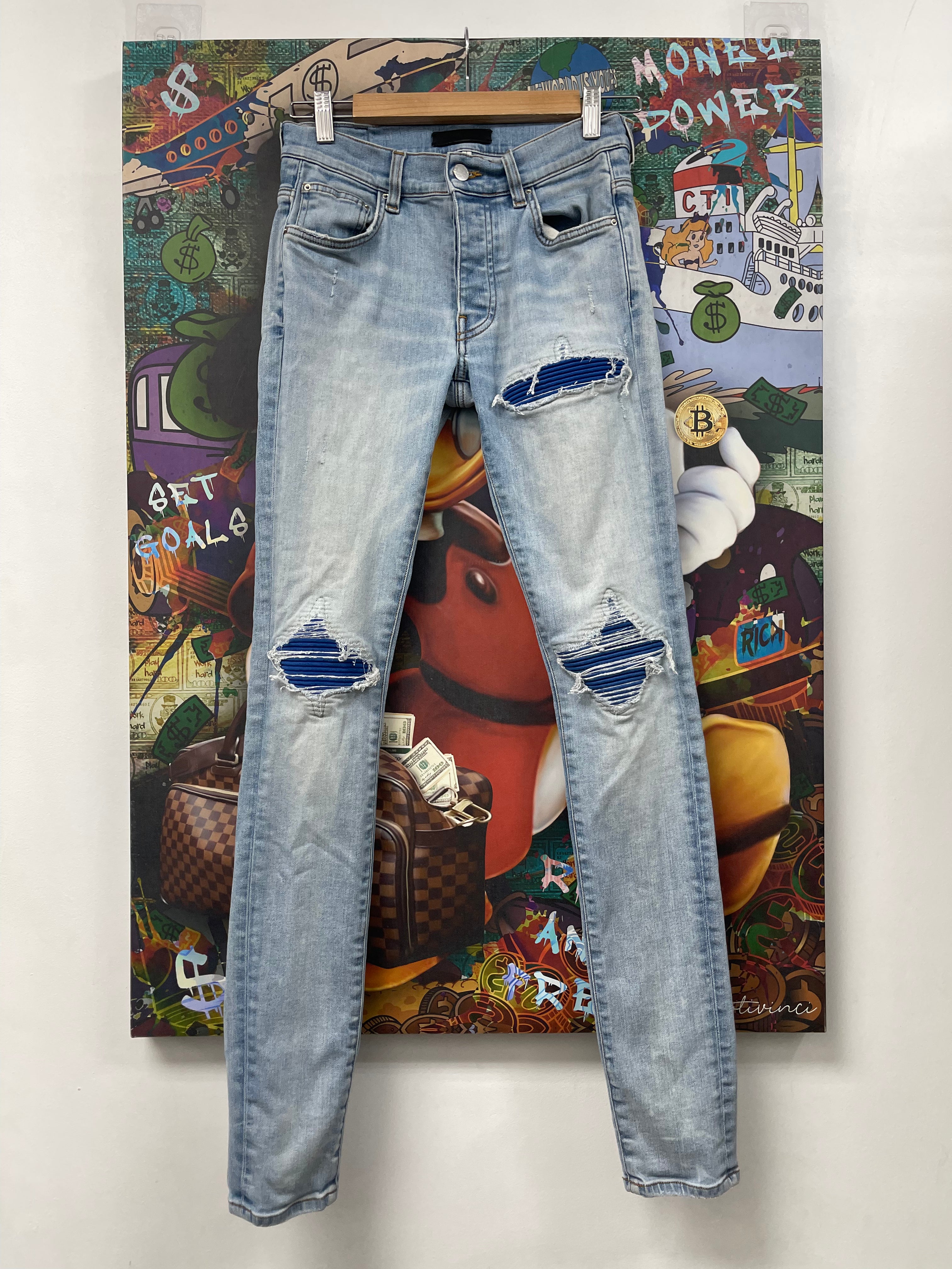 Amiri MX1 Light Wash Blue Suede Patch Jeans