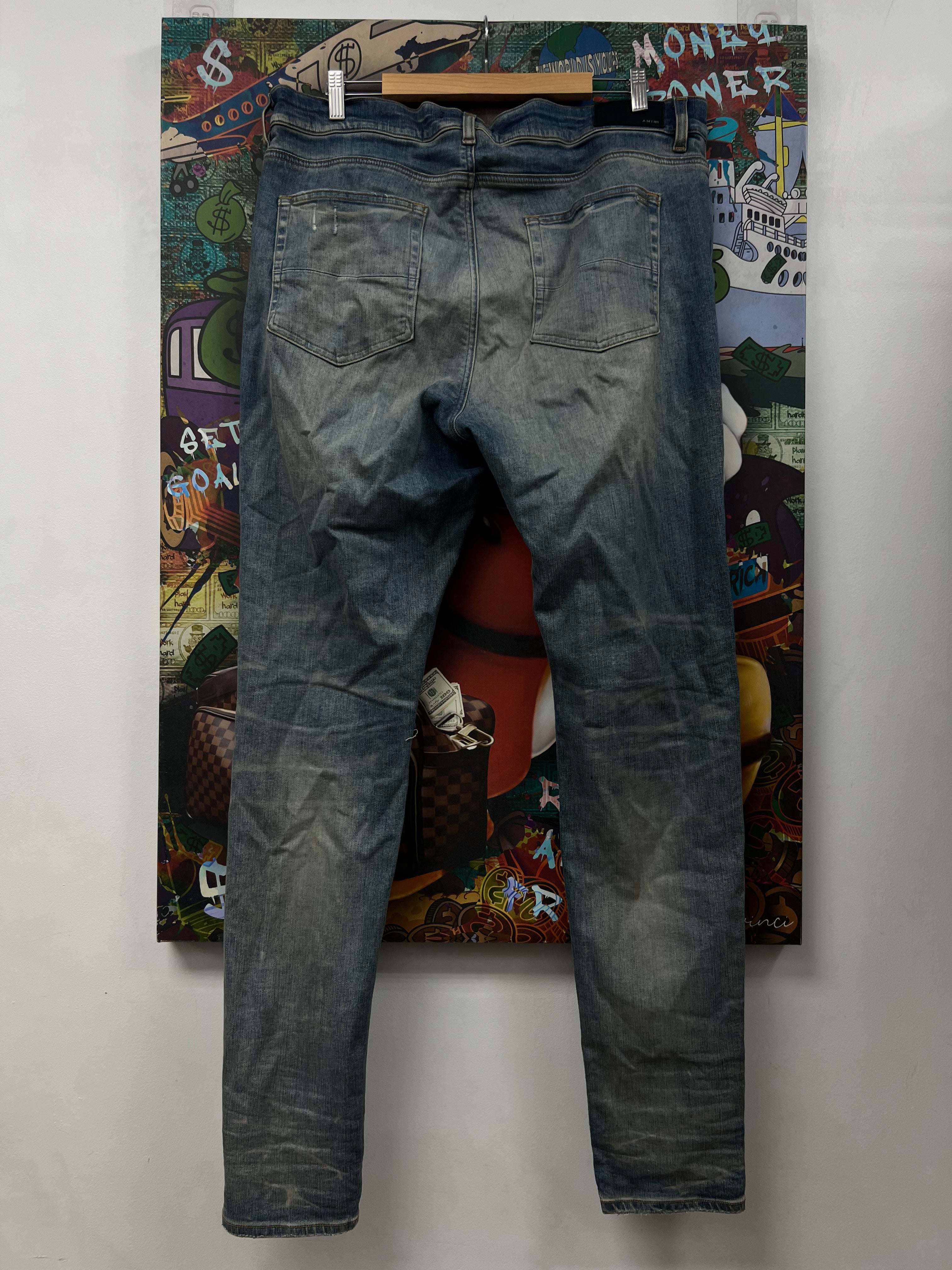 Amiri MX1 Light Wash White Patch Jeans