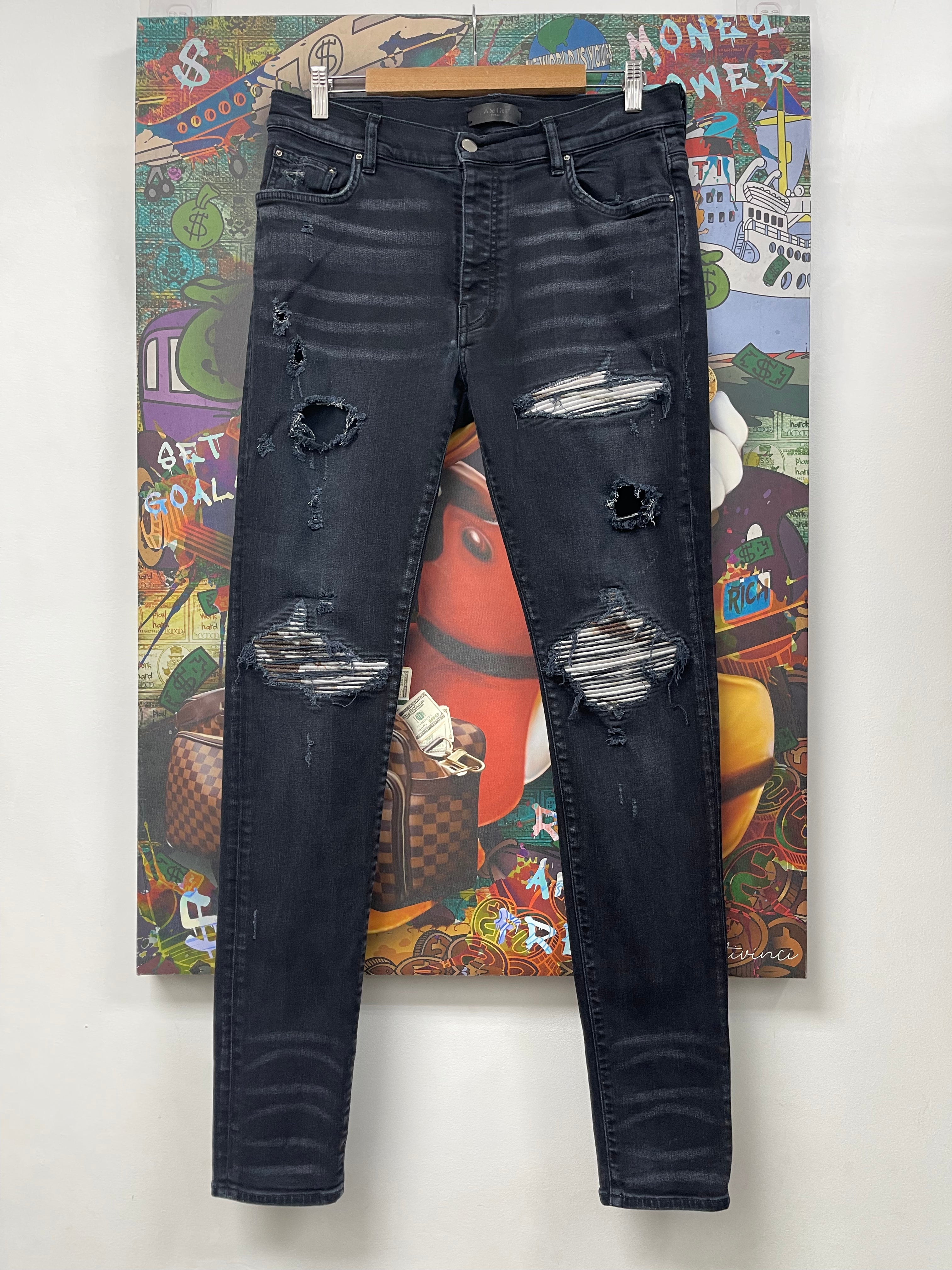 Amiri MX1 Black Wash Marble Patch Jeans