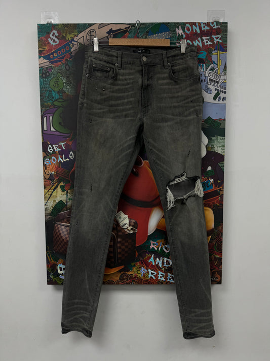 Amiri Grey Ripped Thrasher Jeans Used 34 N/A