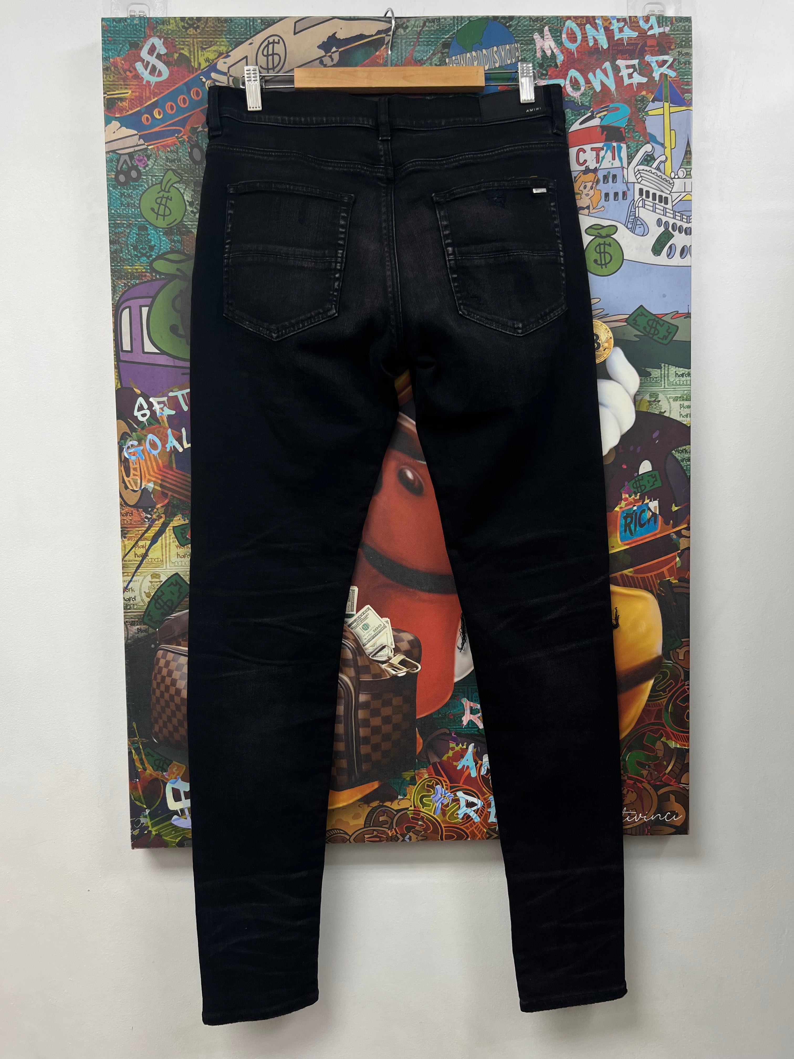 Amiri MX1 Black Wash Red Suede Patch Jeans