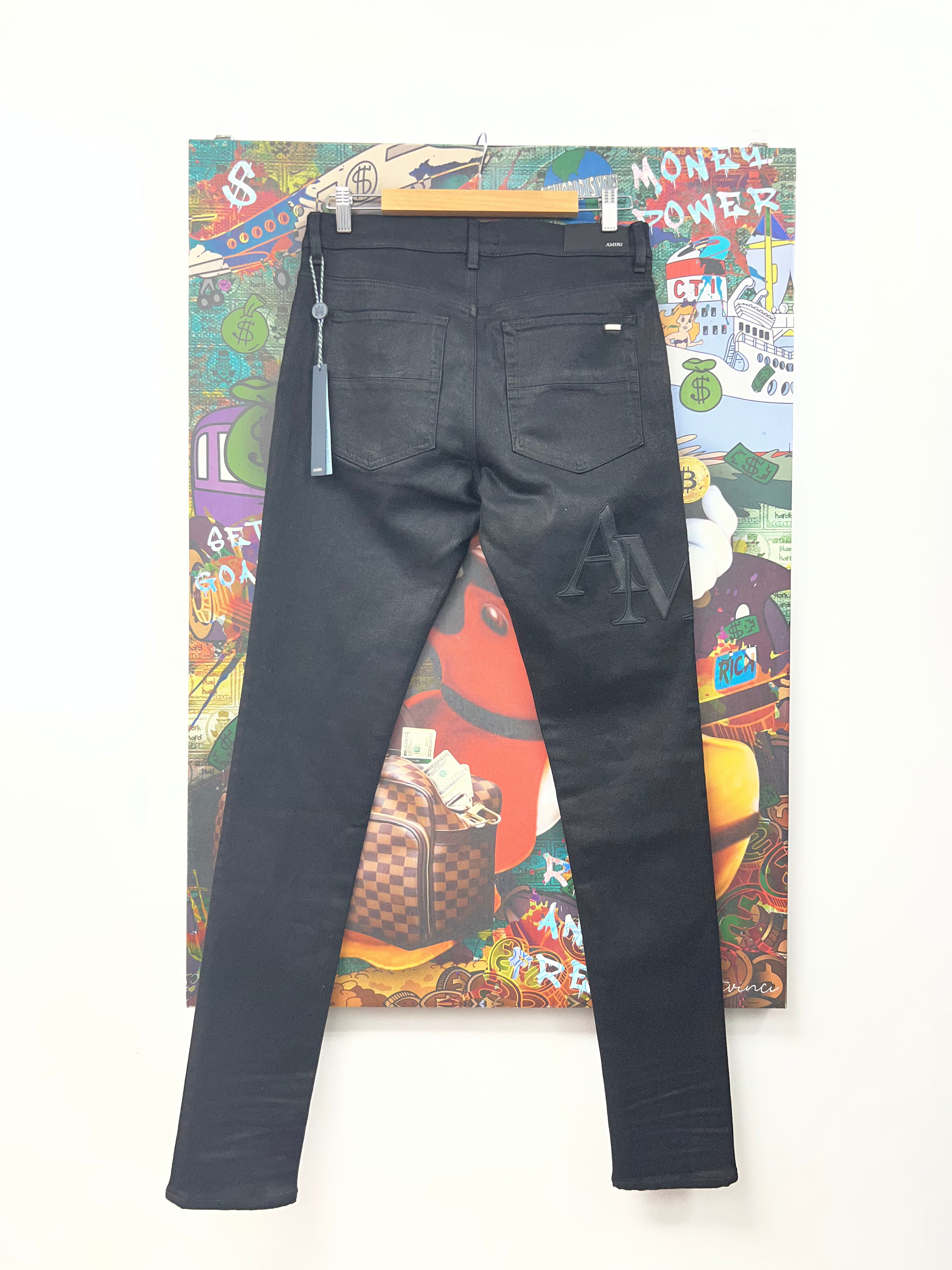 Amiri Black Wax Staggered Logo Jeans