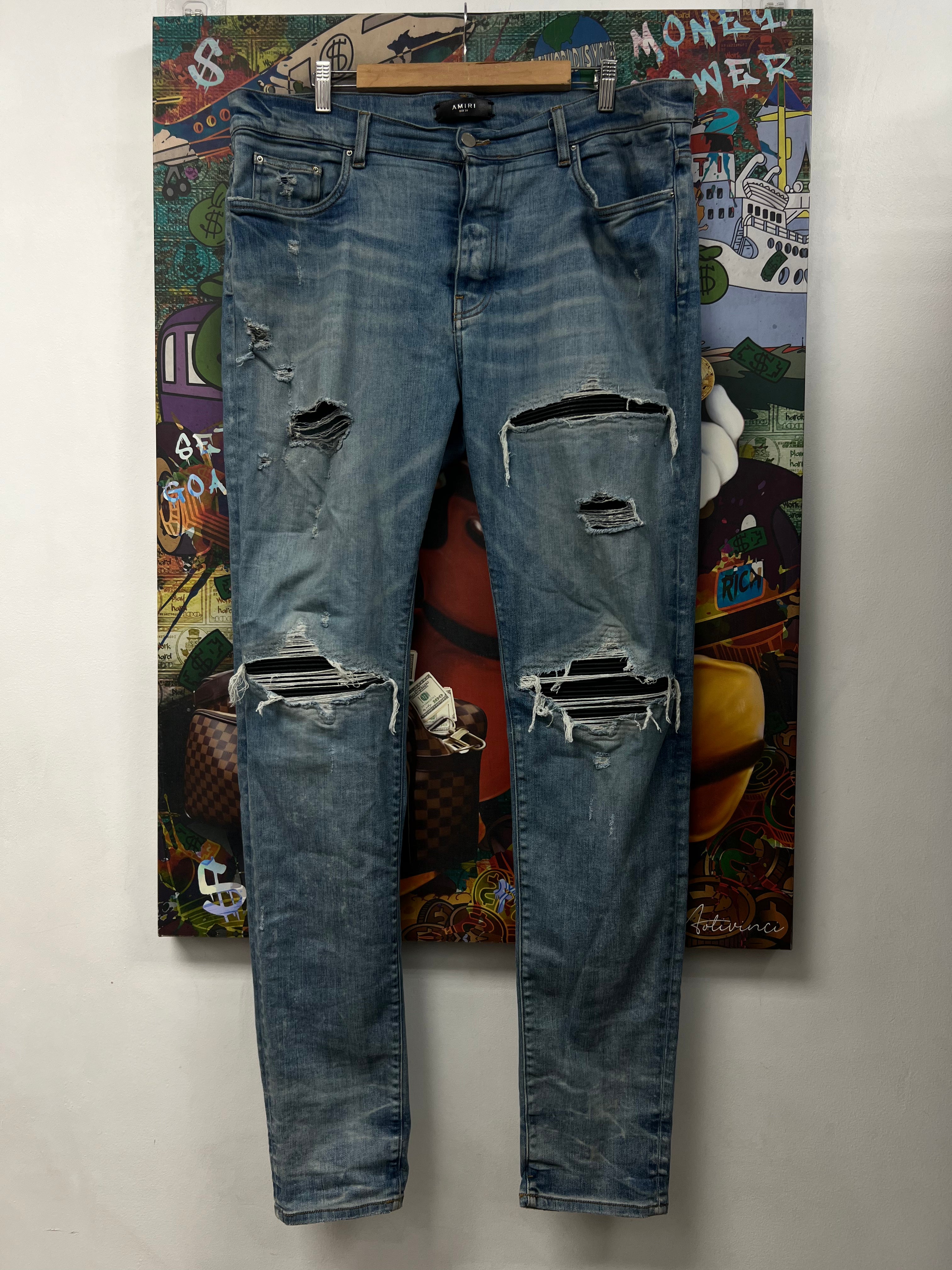 Amiri MX1 Light Wash Black Leather Patch Jeans
