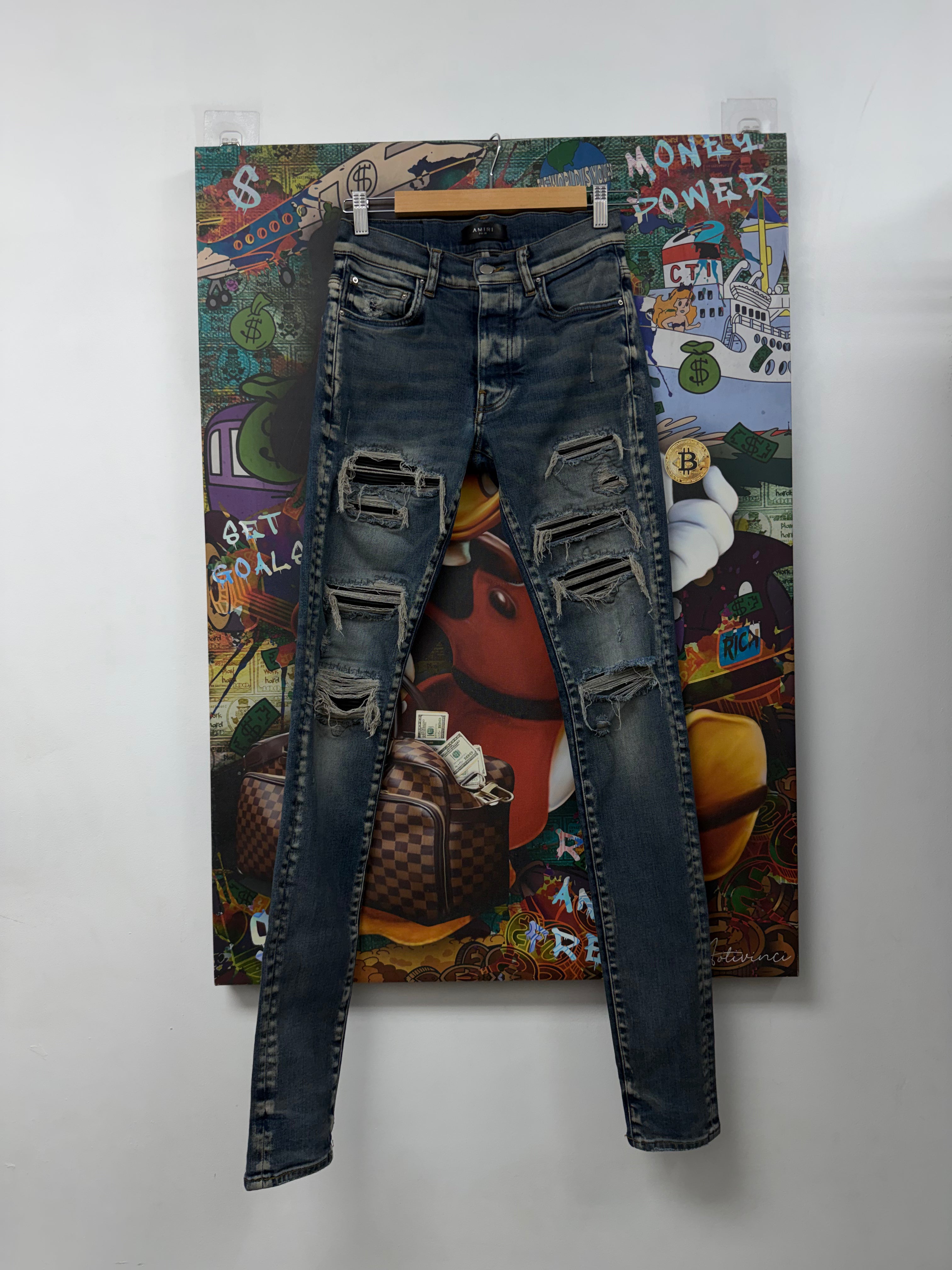 Amiri Dark Indigo Rust Thrasher Patch Jeans