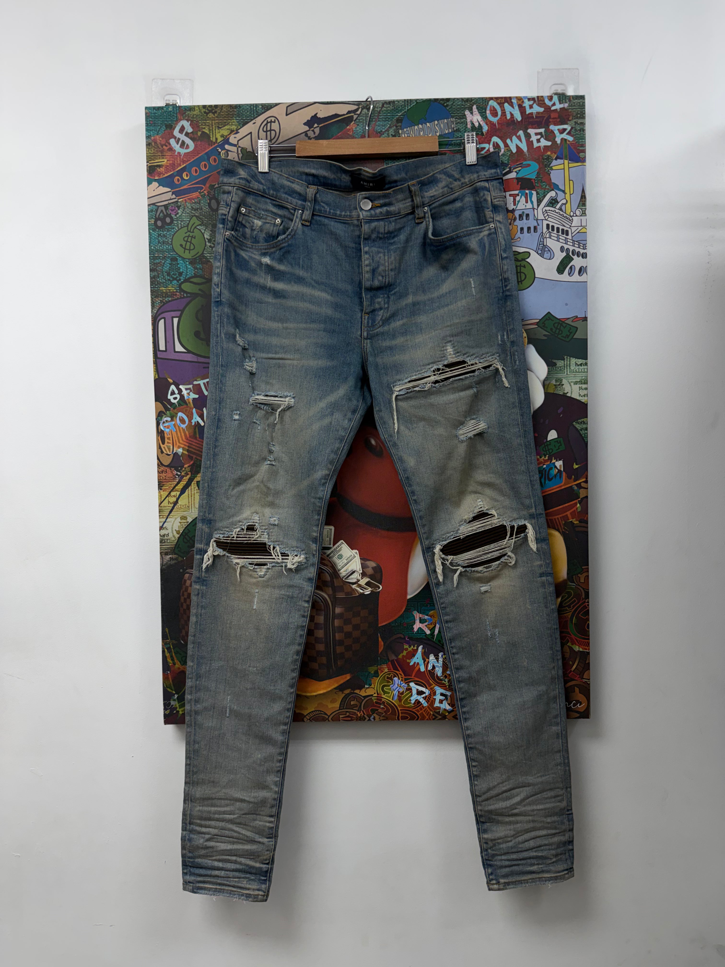 Amiri MX1 Light Wash Brown Patch Jeans