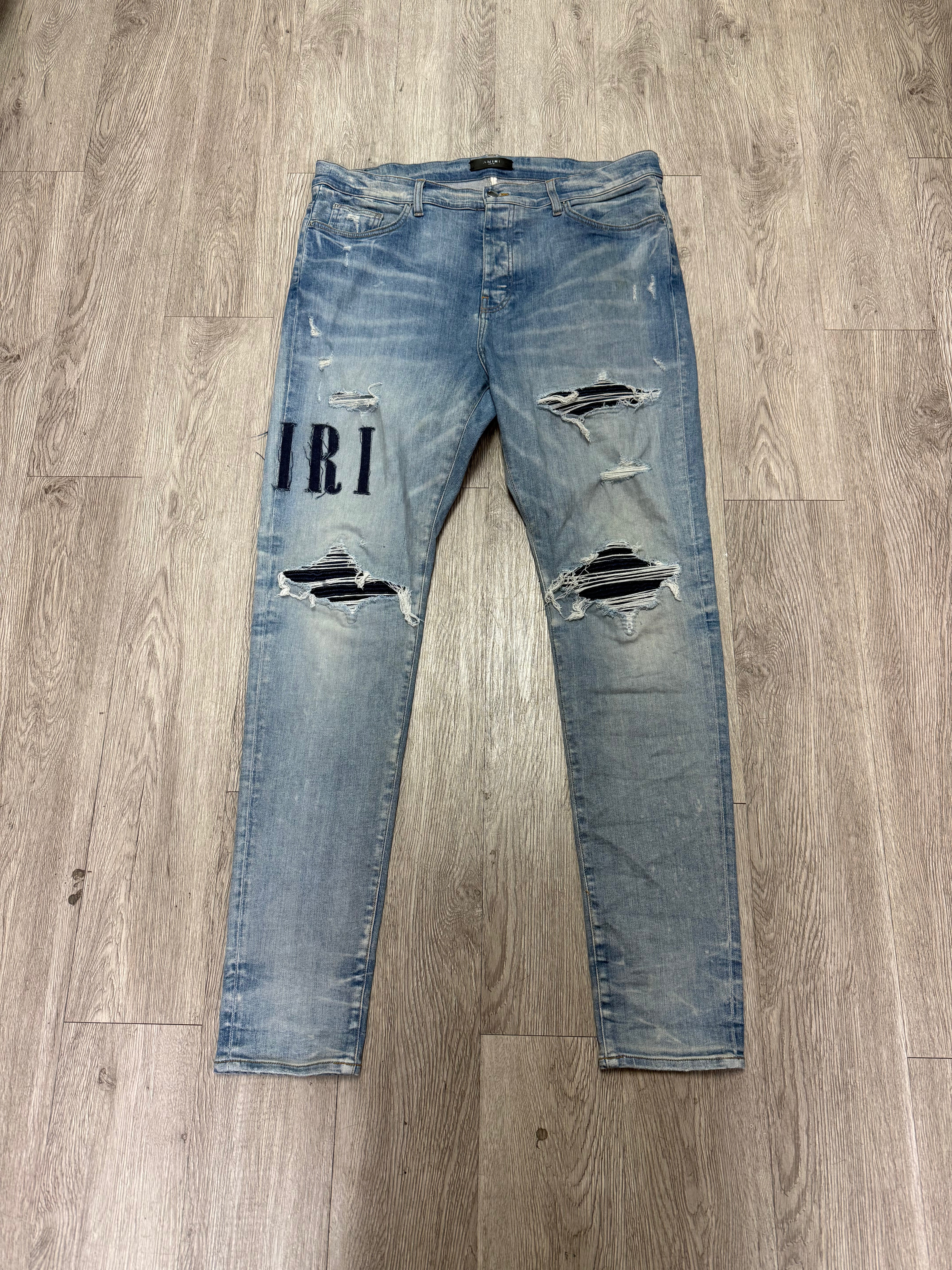Amiri Light Wash Denim Applique MX1 Jeans