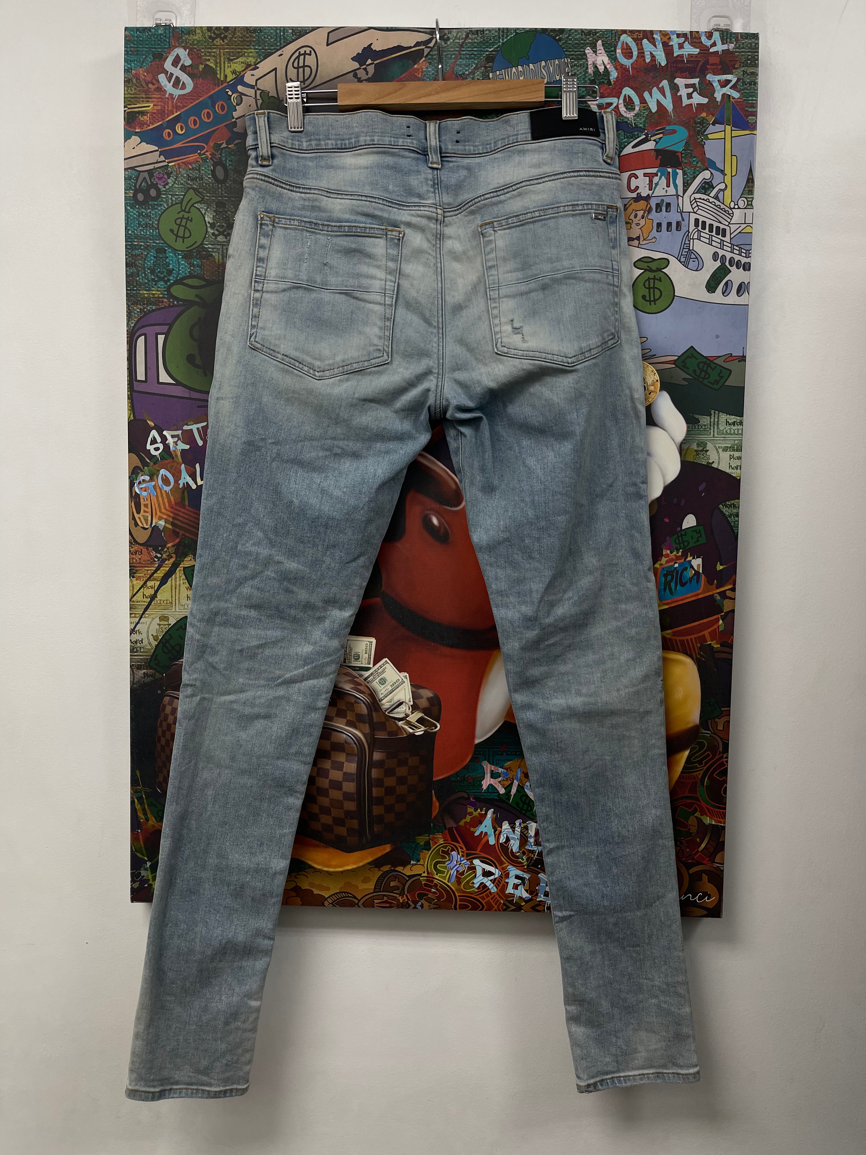 Amiri MX1 Light Wash Sun Dust Yellow Patch Jeans